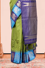 Green Art Silk Saree Body Detailing Zari Butta And Border Are Highlight Contrast Color With Intricate Zari Woven Elephant, Peacock Motifs With Golden Zari WeavingPallu