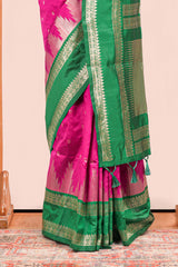 Pink Semi Art Silk Saree Delicate Golden Zari Motifs Along With Thalampoo Zari Woven Across The Body. The Border Is Broad With Intricate Floral Zari Weaving Rich Golden Zari Pallu
