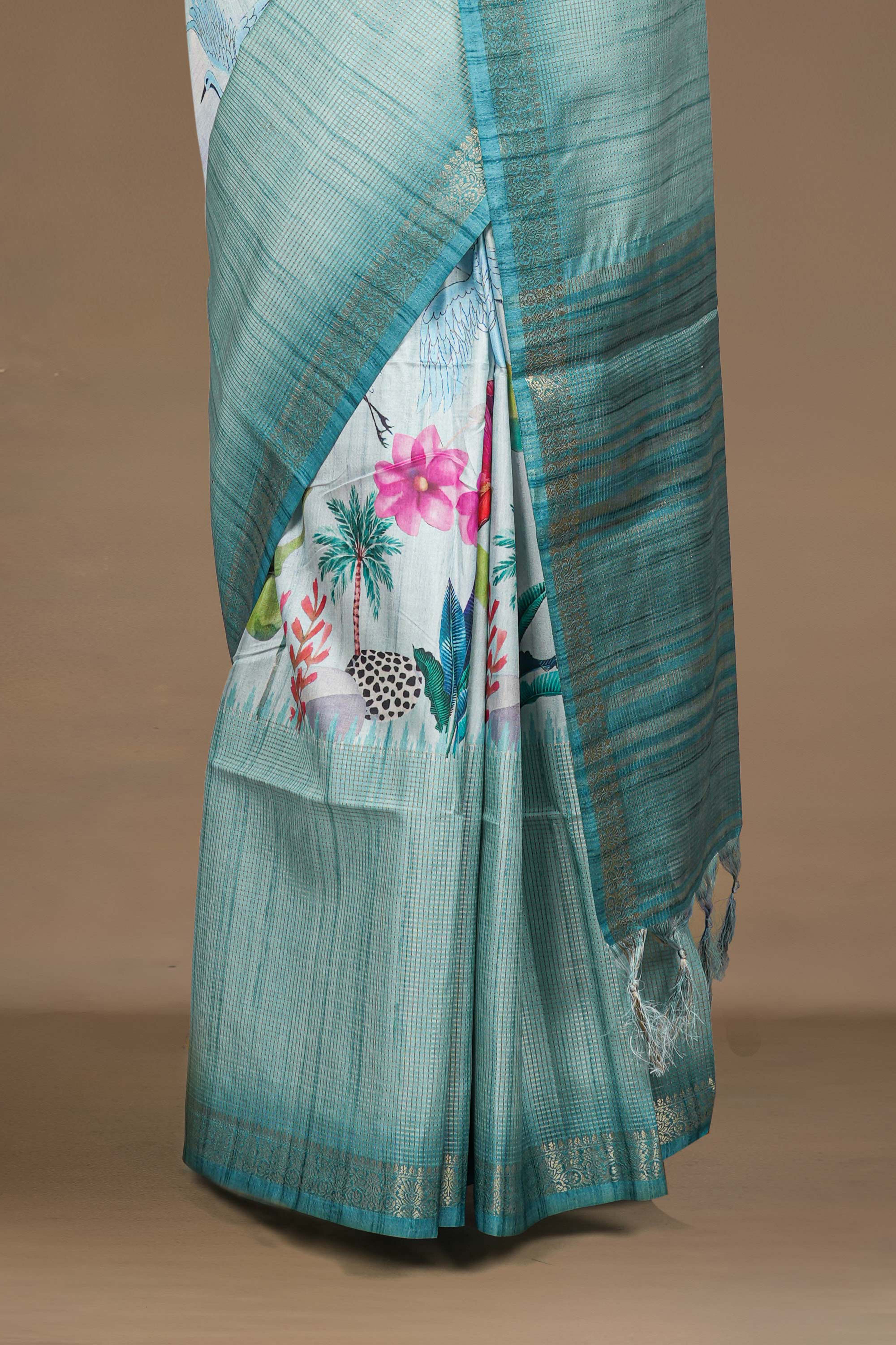 Teal Blue Art Tussar Saree Centre Floral Print Across The Body With Zari Stripes Pallu