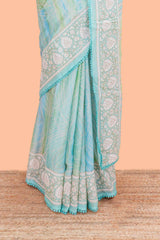 Green Brasso Saree Foil Printed Across The Body And Floral Motifs Pallu