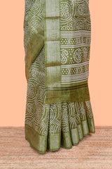 Green south cotton saree with bandhini print body & pallu and silver bawanchi border