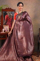 Deep Wine Semi Soft Silk Saree with intricate gold zari floral vine weaving patterns and Rich zari woven pallu with Matching blouse