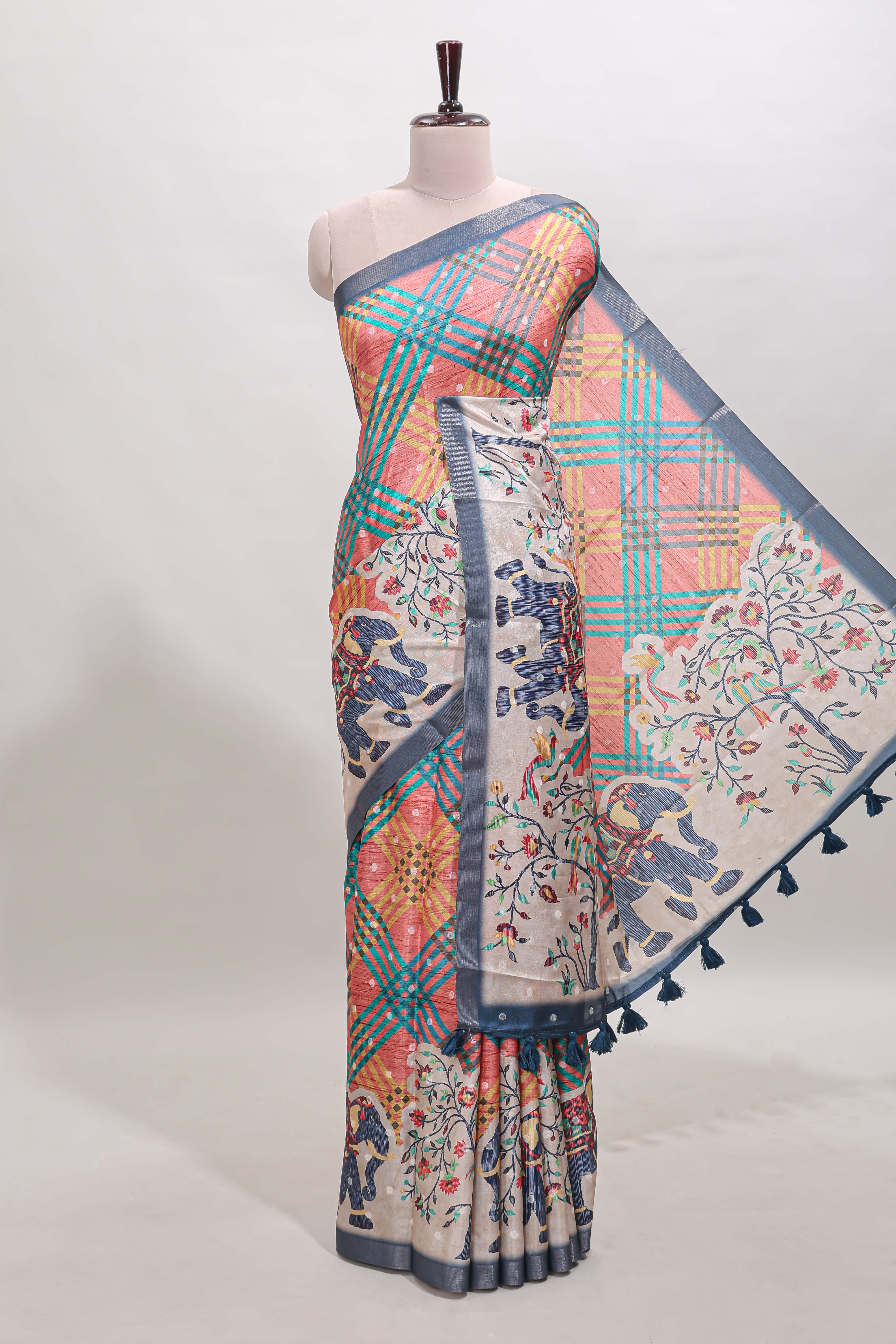 Blue Tussar Saree checkered body artistic elephant and floral prints and contrasting border with tassel along with blouse piece