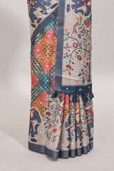 Blue Tussar Saree checkered body artistic elephant and floral prints and contrasting border with tassel along with blouse piece