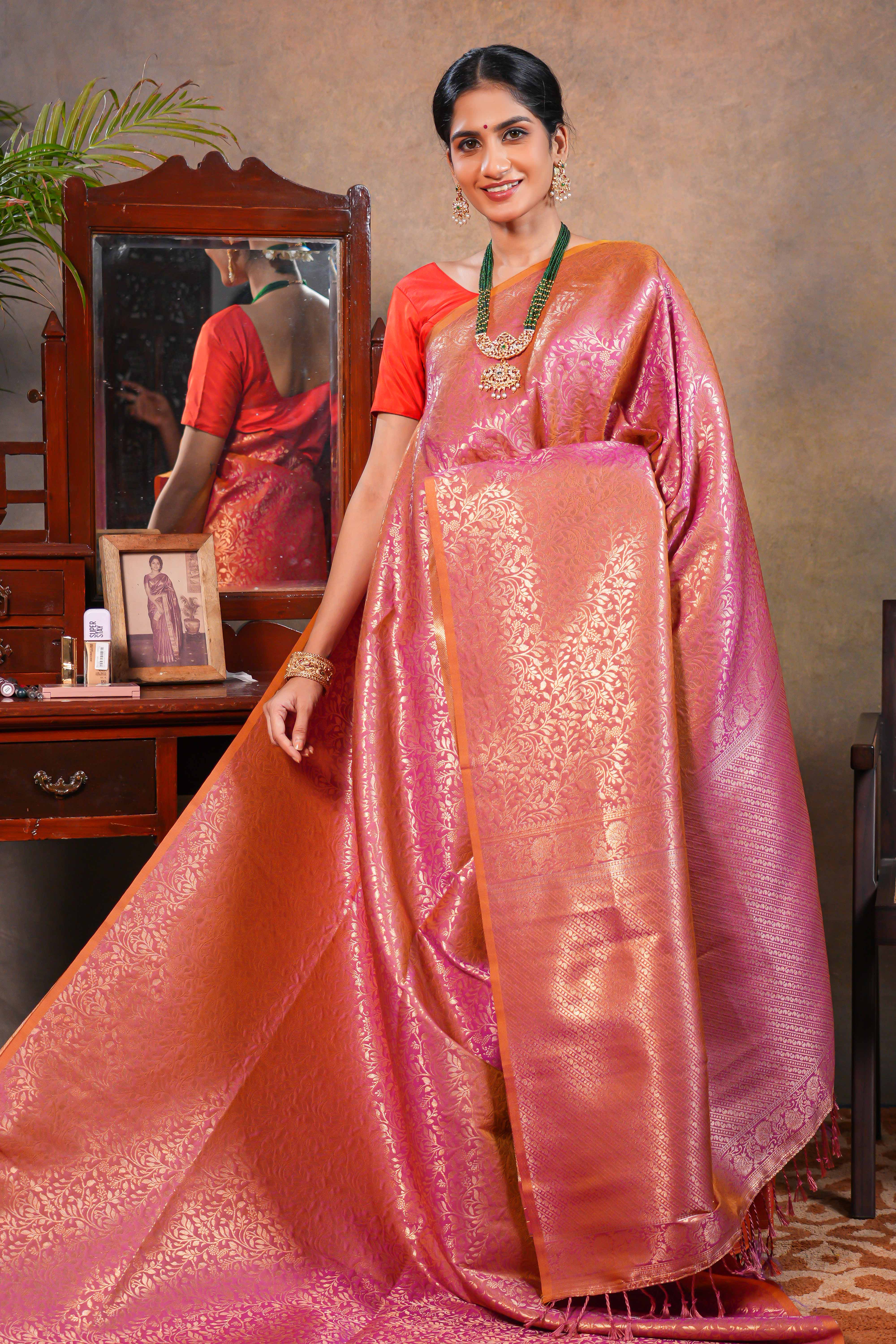 Rose Semi Soft Silk Saree with intricate gold zari floral vine weaving patterns and Rich zari woven pallu with Matching blouse