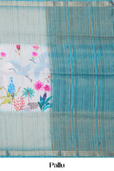 Teal Blue Art Tussar Saree Centre Floral Print Across The Body With Zari Stripes Pallu