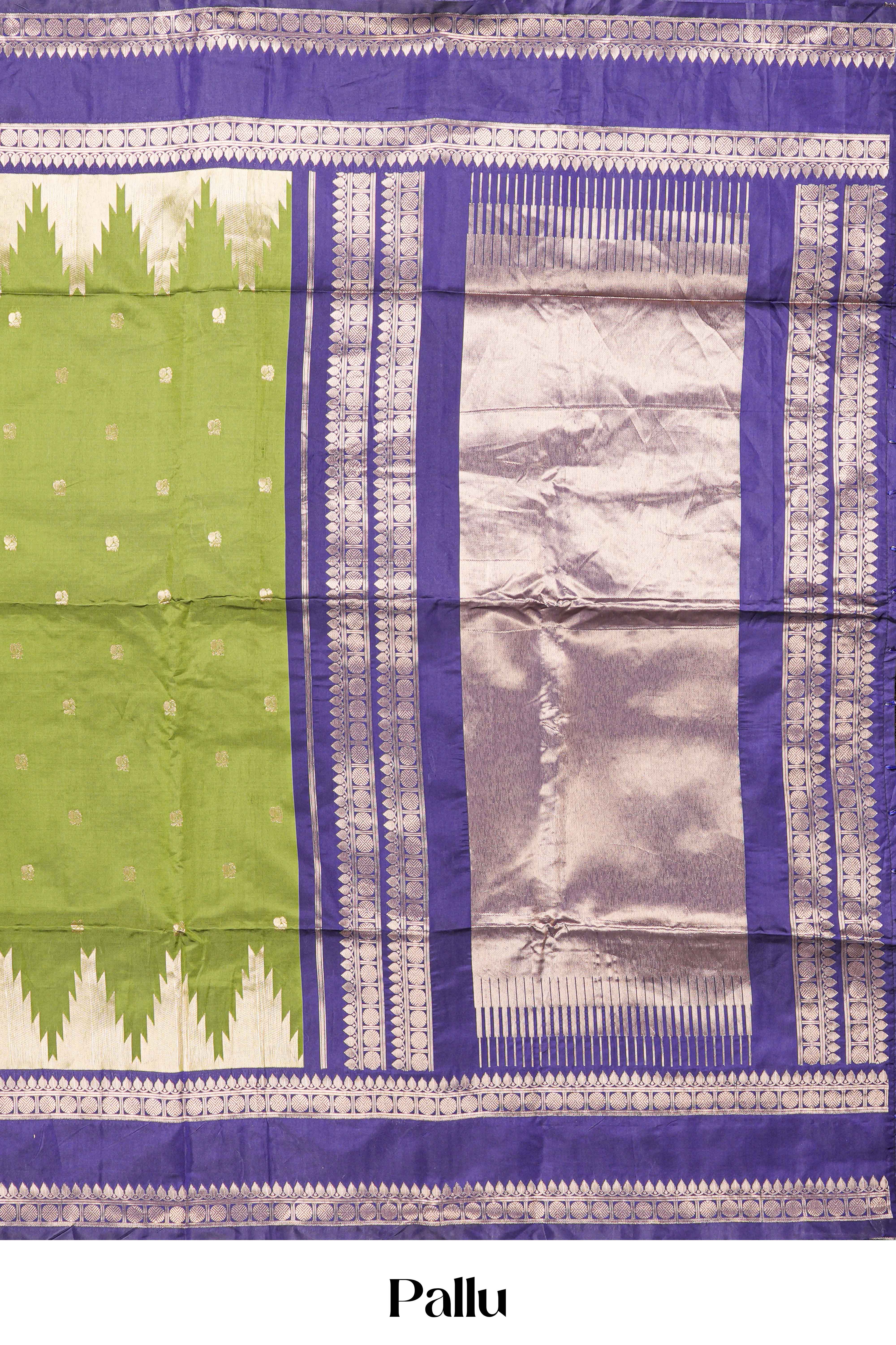 Green Semi Art Silk Saree Delicate Golden Zari Motifs Along With Thalampoo Zari Woven Across The Body. The Border Is Broad With Intricate Floral Zari Weaving Rich Golden Zari Pallu
