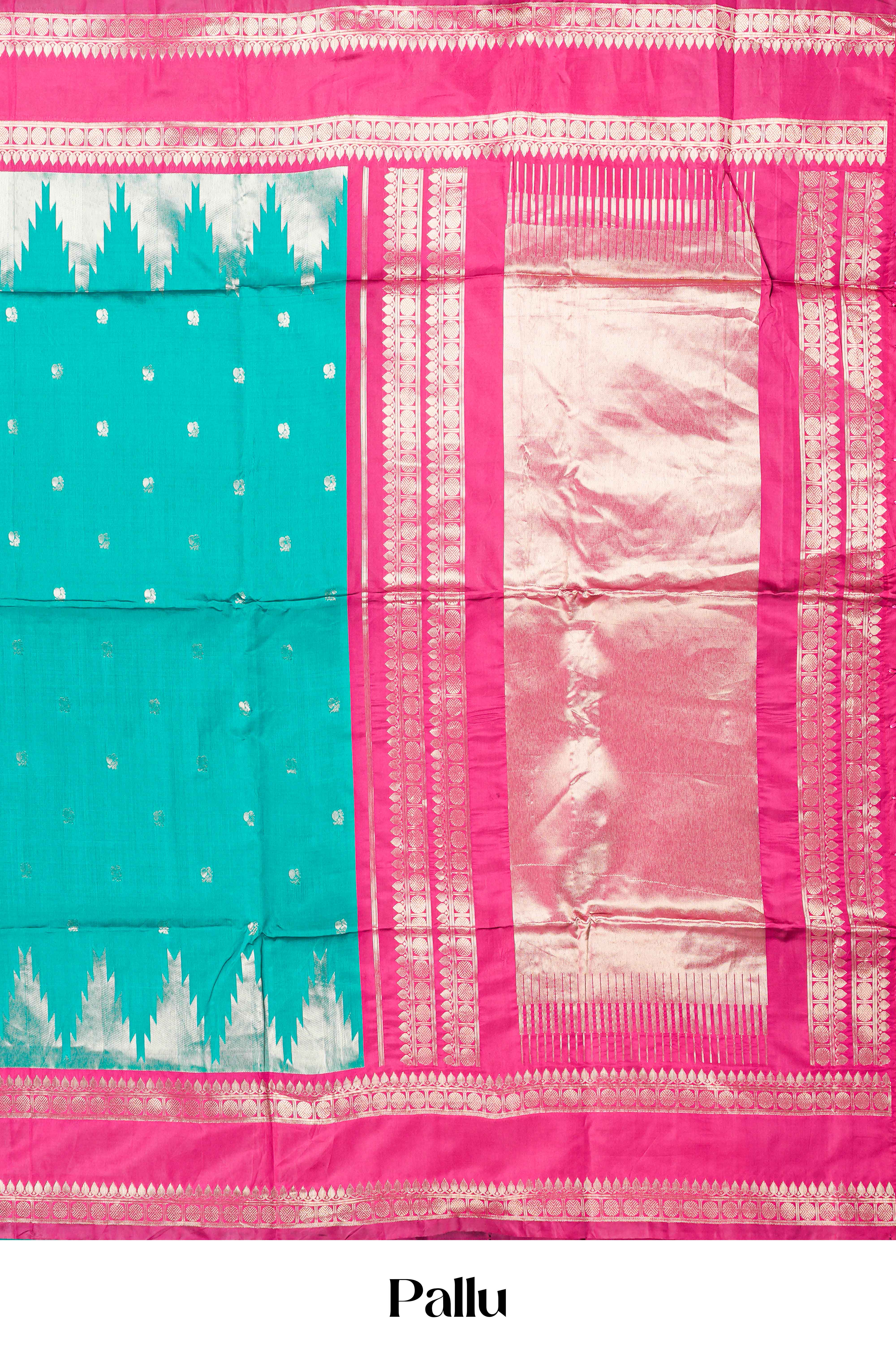 Rama Green Semi Art Silk Saree Delicate Golden Zari Motifs Along With Thalampoo Zari Woven Across The Body. The Border Is Broad With Intricate Floral Zari Weaving Rich Golden Zari Pallu