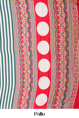 White Modal Silk Saree Detailing Vertical Green Stripes That Add a Sleek and Elegant Touch. Highlighted Contrast Ajrakh Print Pallu Along With Blouse