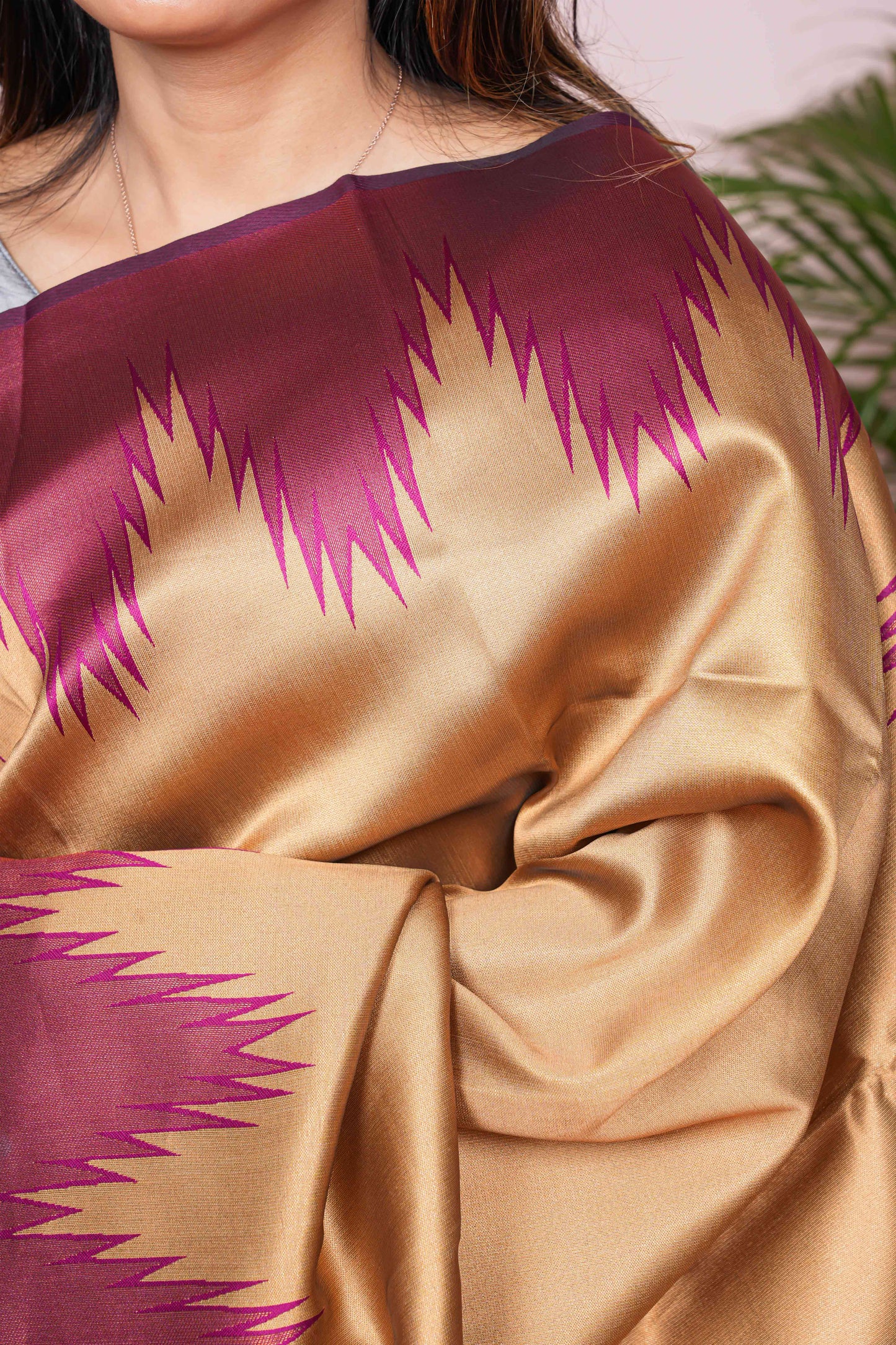 saree with gold and maroon pattern