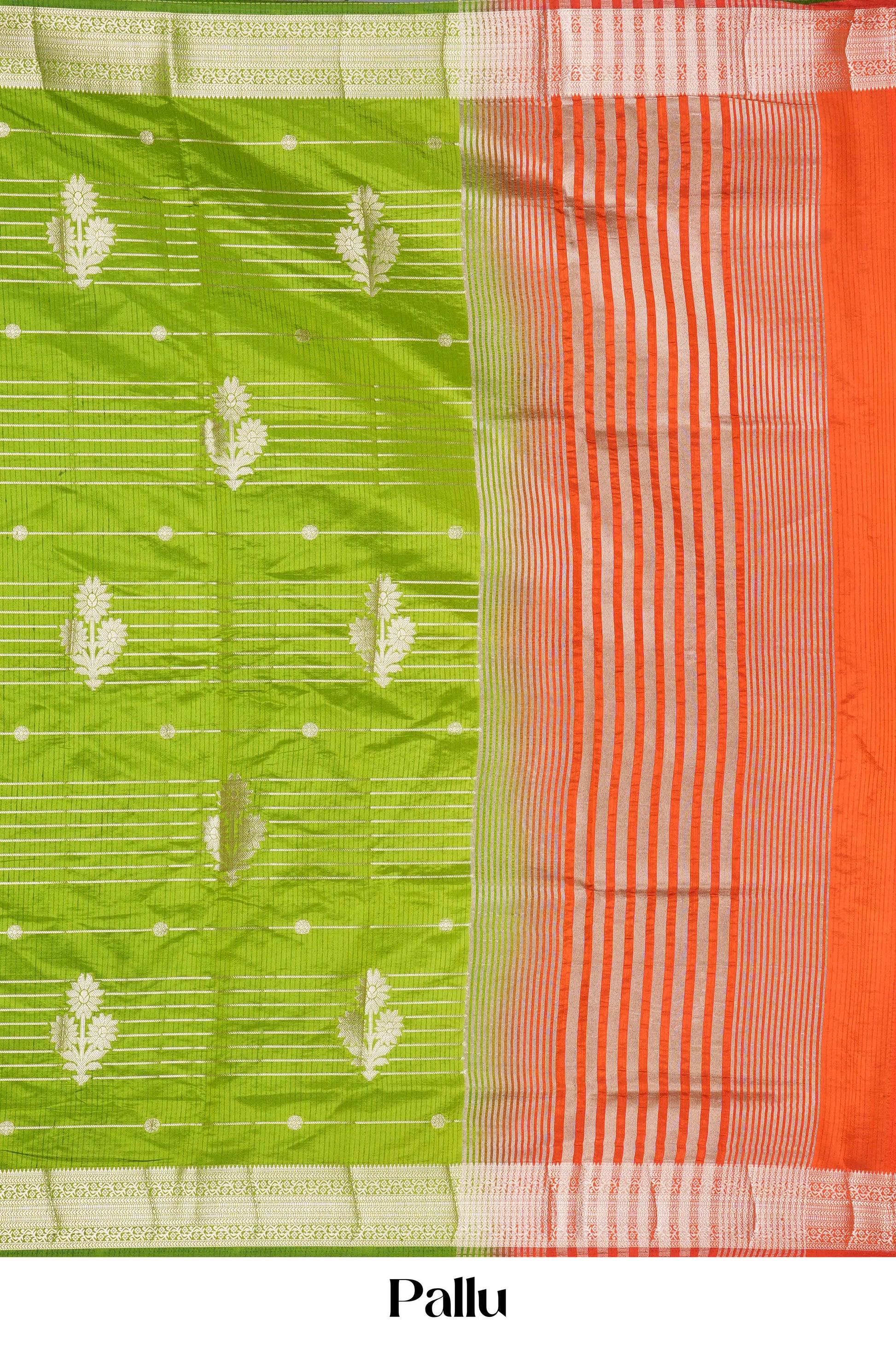 Green and red saree with a patterned pallu