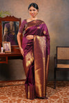 Maroon colour Semi soft Silk Saree Gold Zari Buttas design with Floral Woven Zari Border and Matching Blouse
