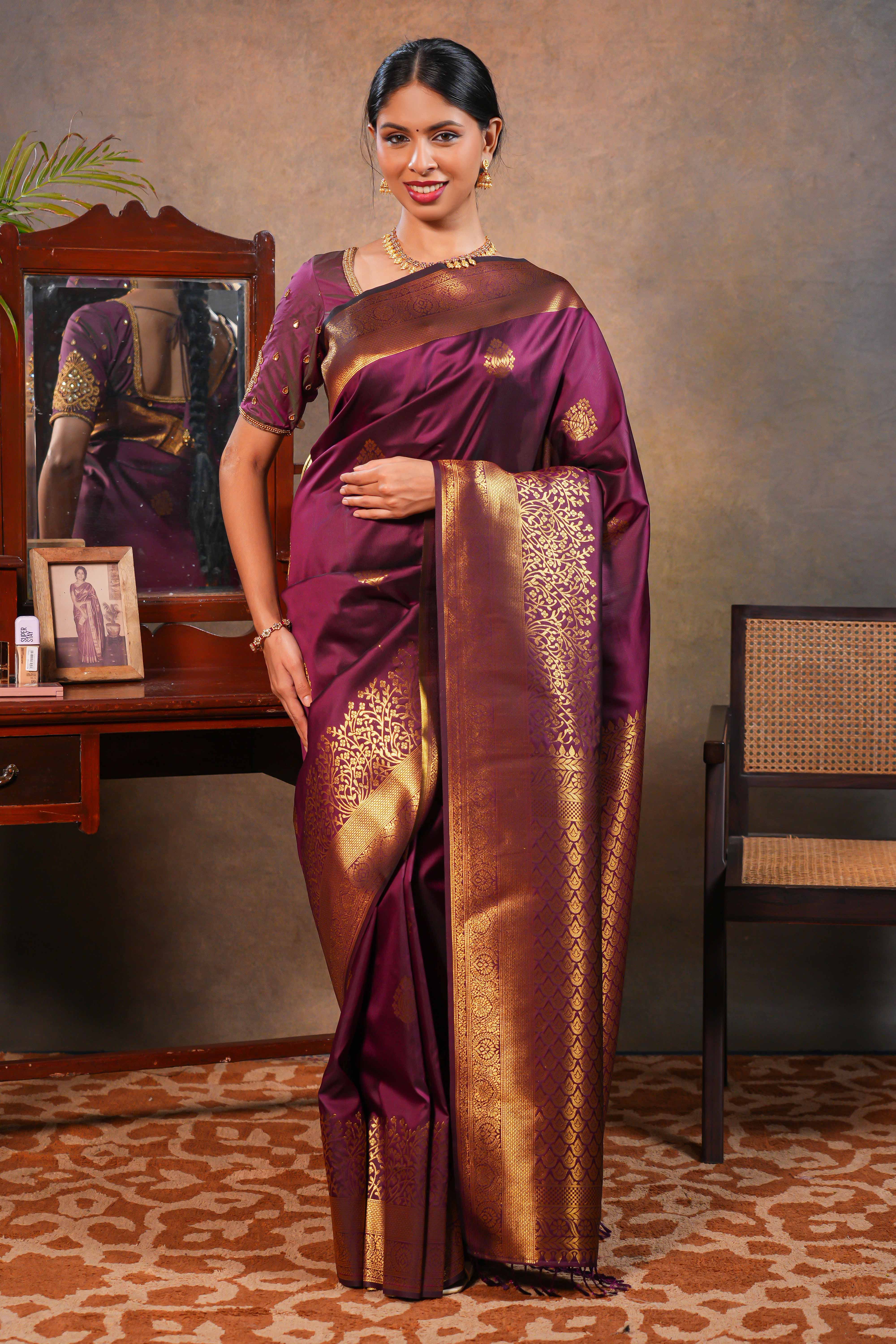 Maroon colour Semi soft Silk Saree Gold Zari Buttas design with Floral Woven Zari Border and Matching Blouse