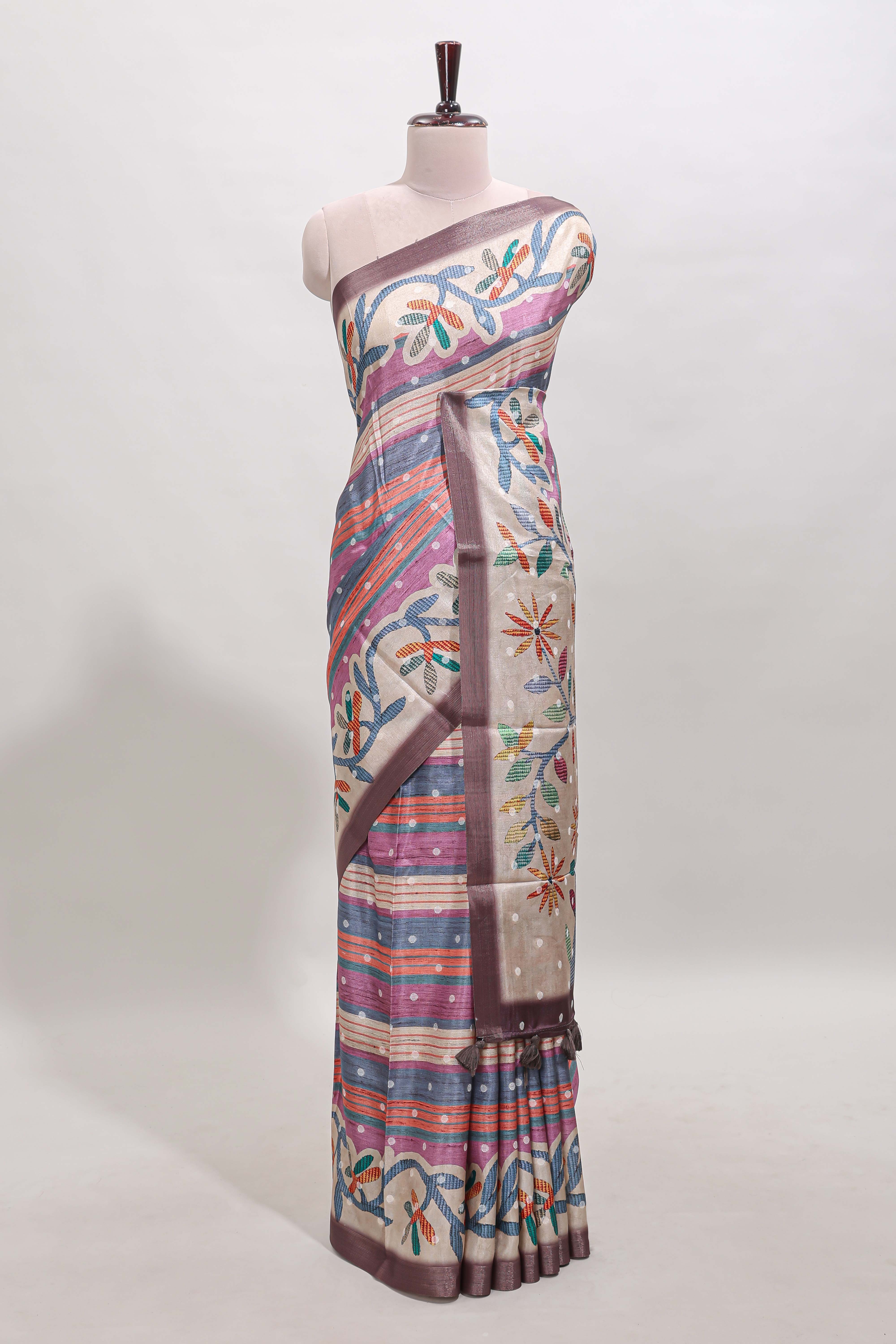 Violet Tussar Saree checkered body artistic floral prints and contrasting border with tassel along with blouse piece