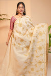 Cream floral design linen cotton saree with self zari border and matching printed blouse