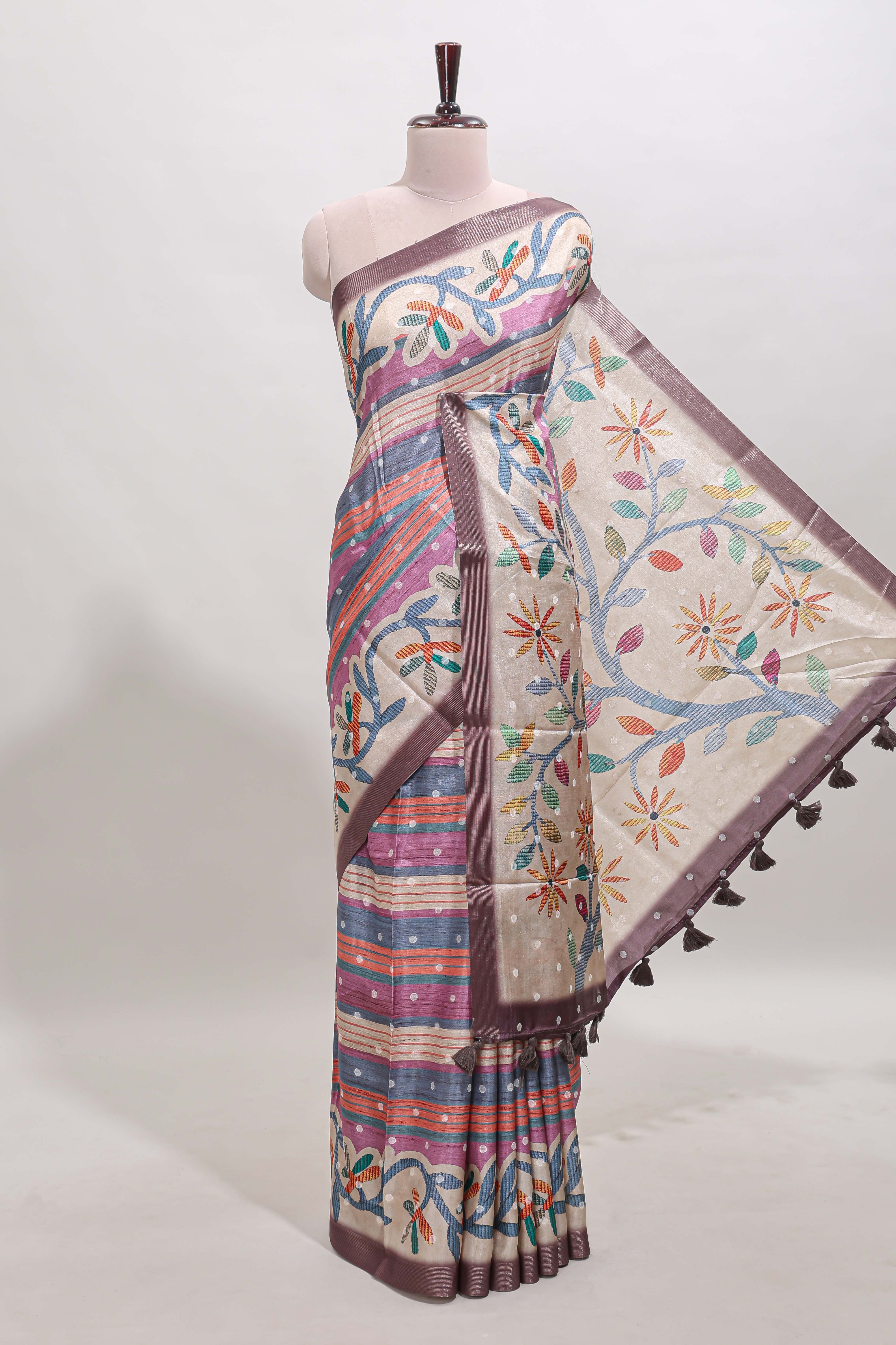 Violet Tussar Saree checkered body artistic floral prints and contrasting border with tassel along with blouse piece