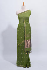 Green thread butta south cotton saree with self zari border and matching pallu