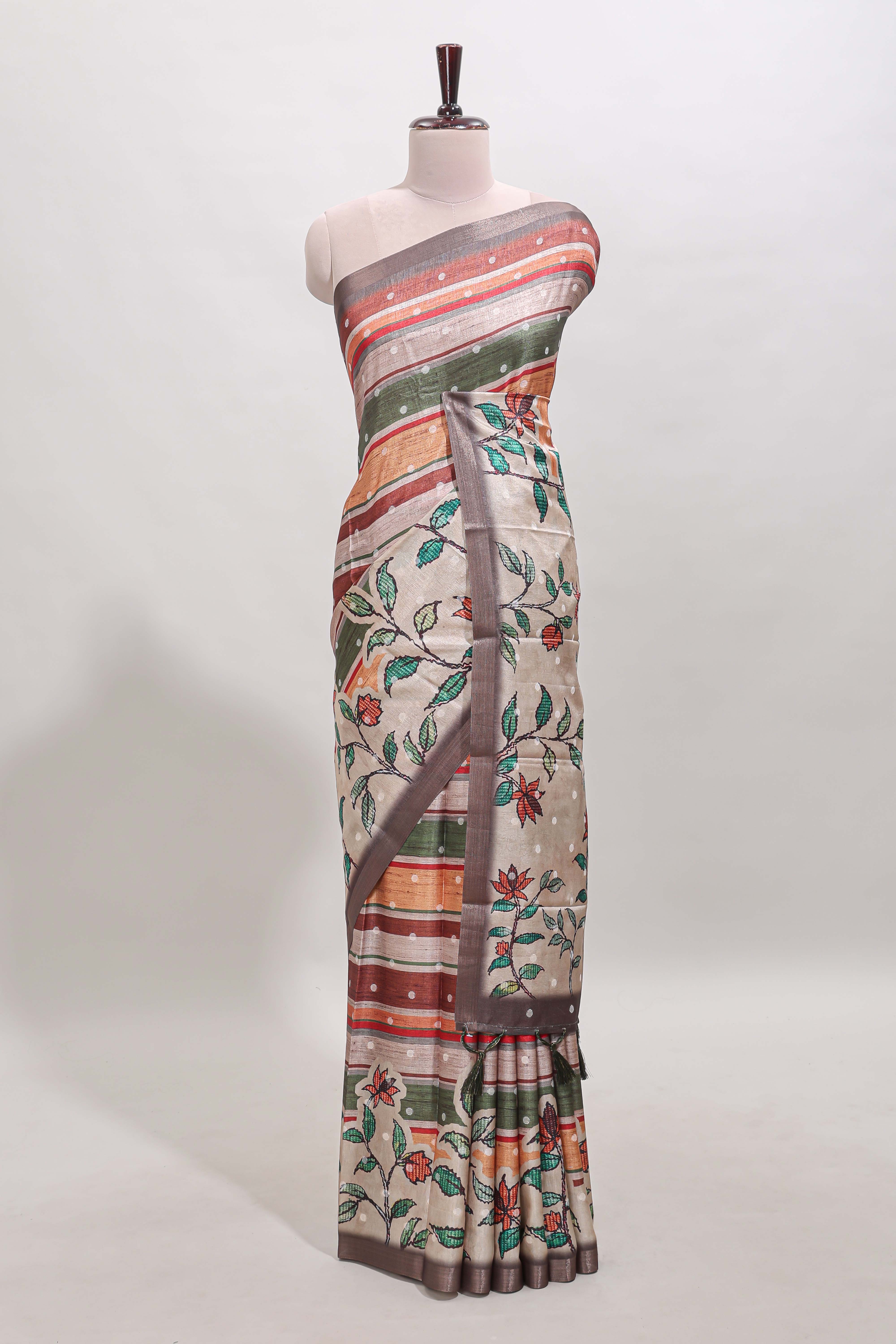 Multicolor Tussar Saree checkered body artistic floral prints and contrasting border with tassel along with blouse piece