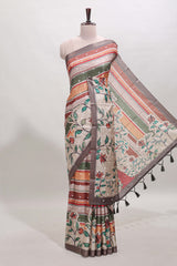 Multicolor Tussar Saree checkered body artistic floral prints and contrasting border with tassel along with blouse piece