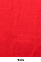 Black Modal Silk Saree The Body Has Ajrakh Design The Pallu Are Highlighted Vibrant Red Colour Along With Blouse