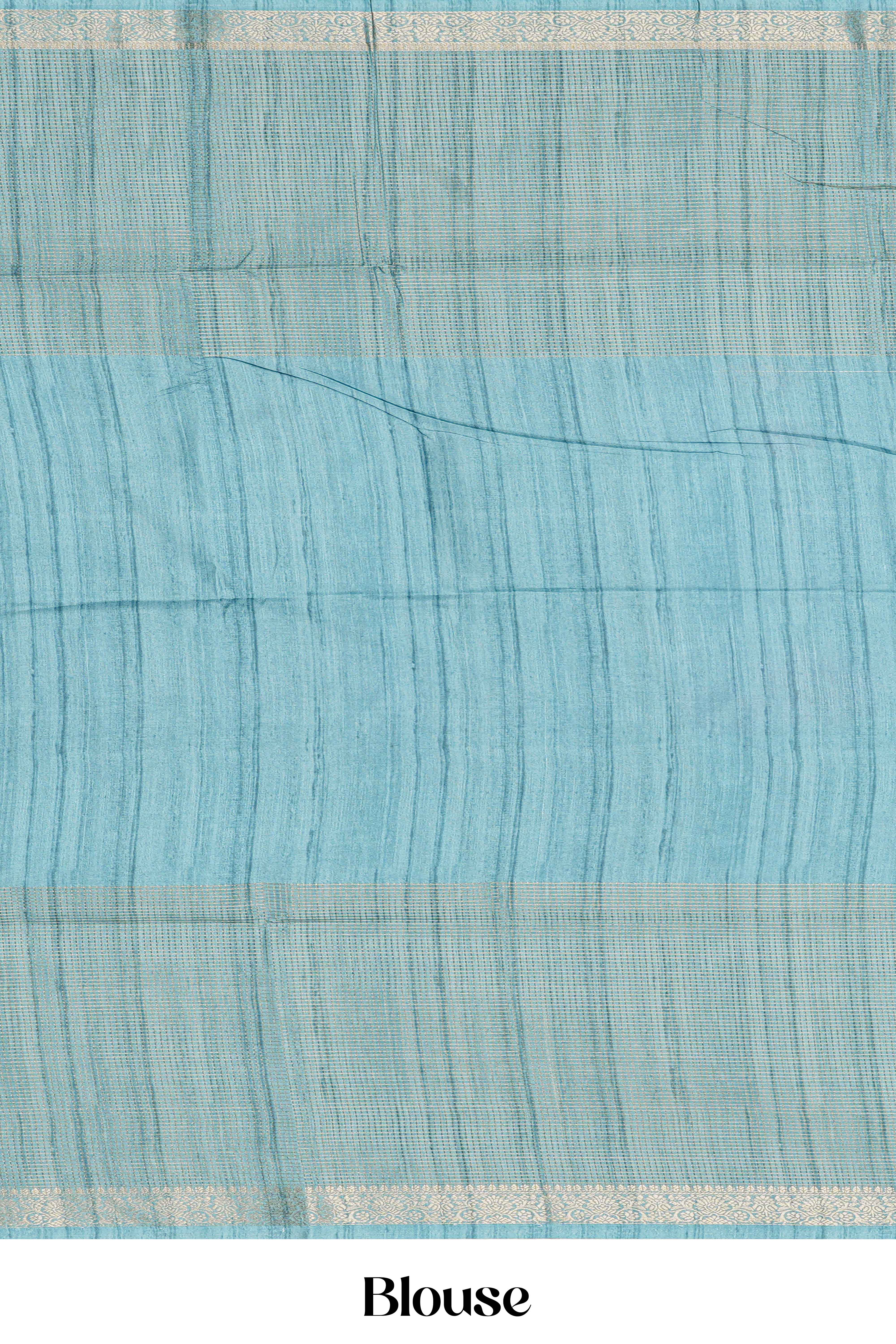 Teal Blue Art Tussar Saree Centre Floral Print Across The Body With Zari Stripes Pallu