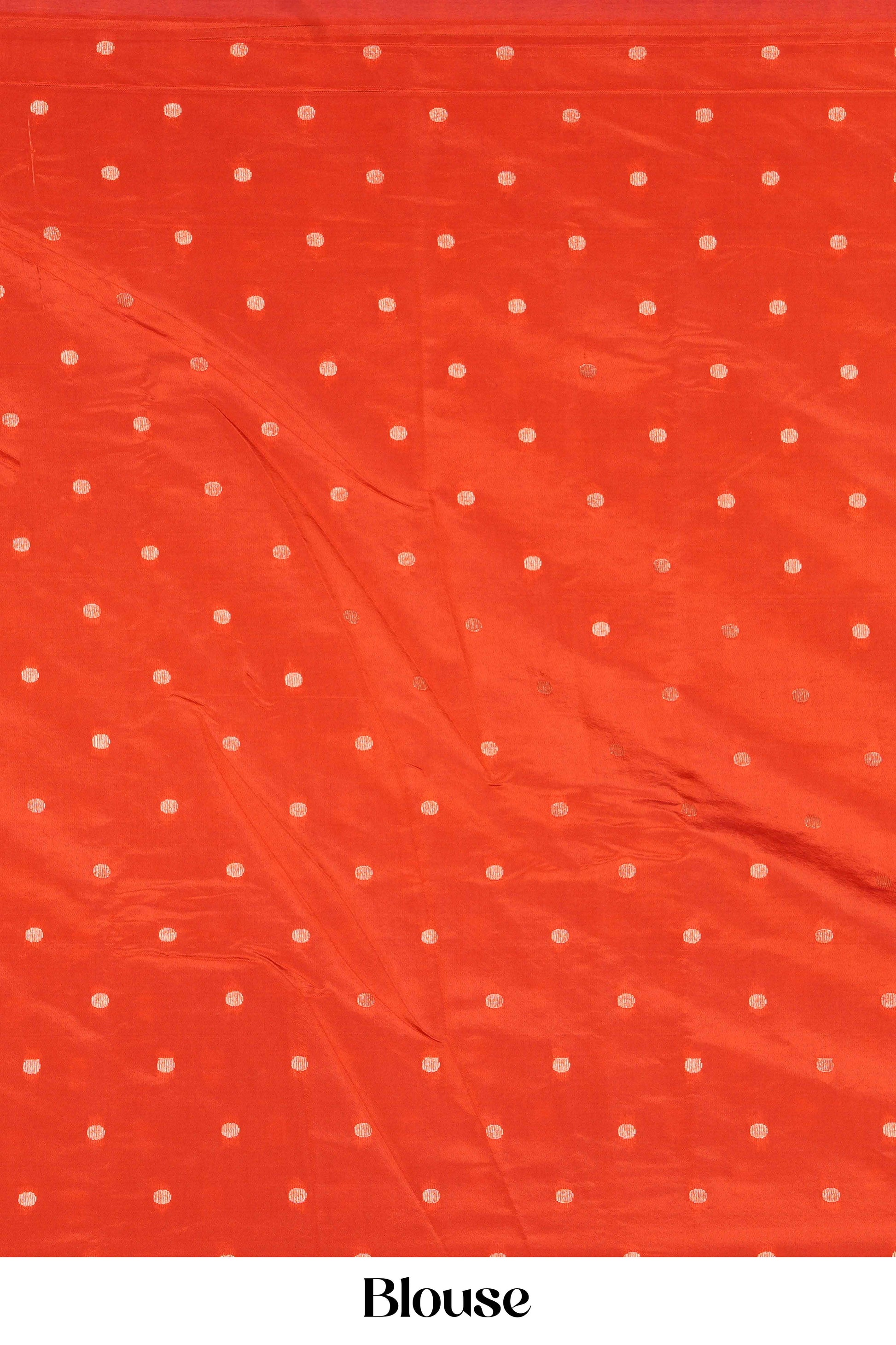 Orange fabric with white polka dots and 'Blouse'