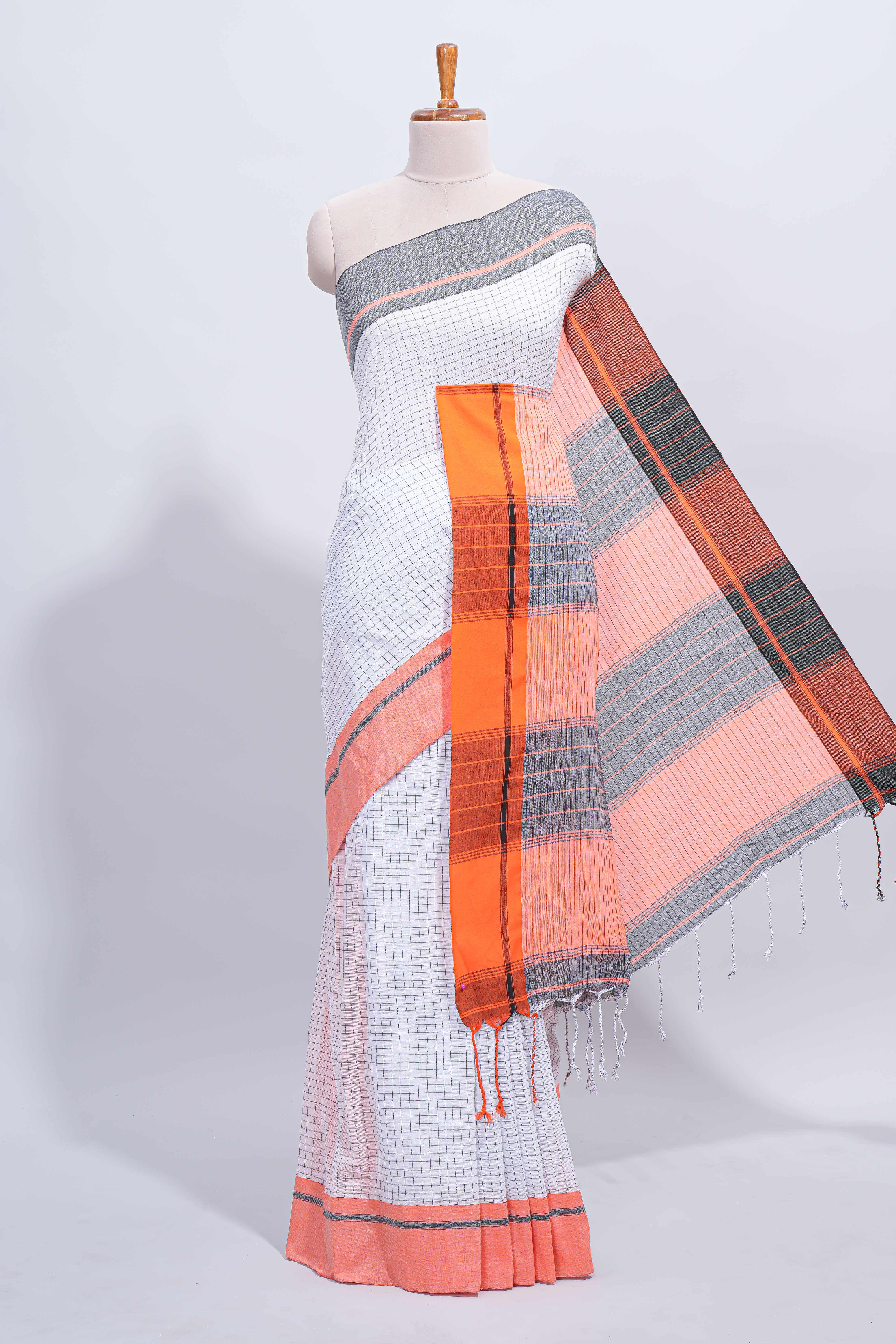 White checked south cotton saree with contrast border and matching striped pallu