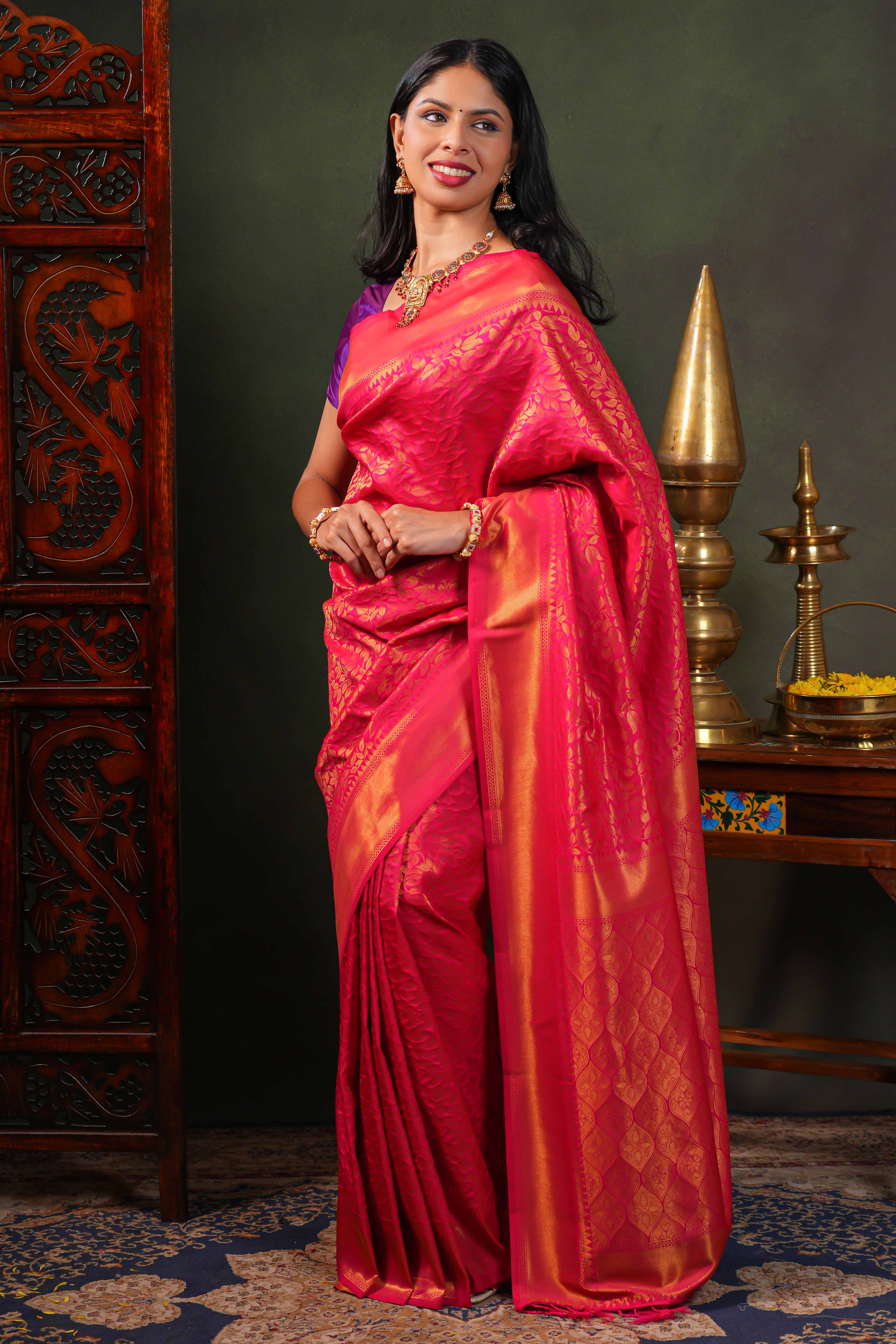 Pink colour Semi Soft Silk Saree with intricate gold zari Leaf vine weaving patterns and Rich zari woven pallu with Matching blouse