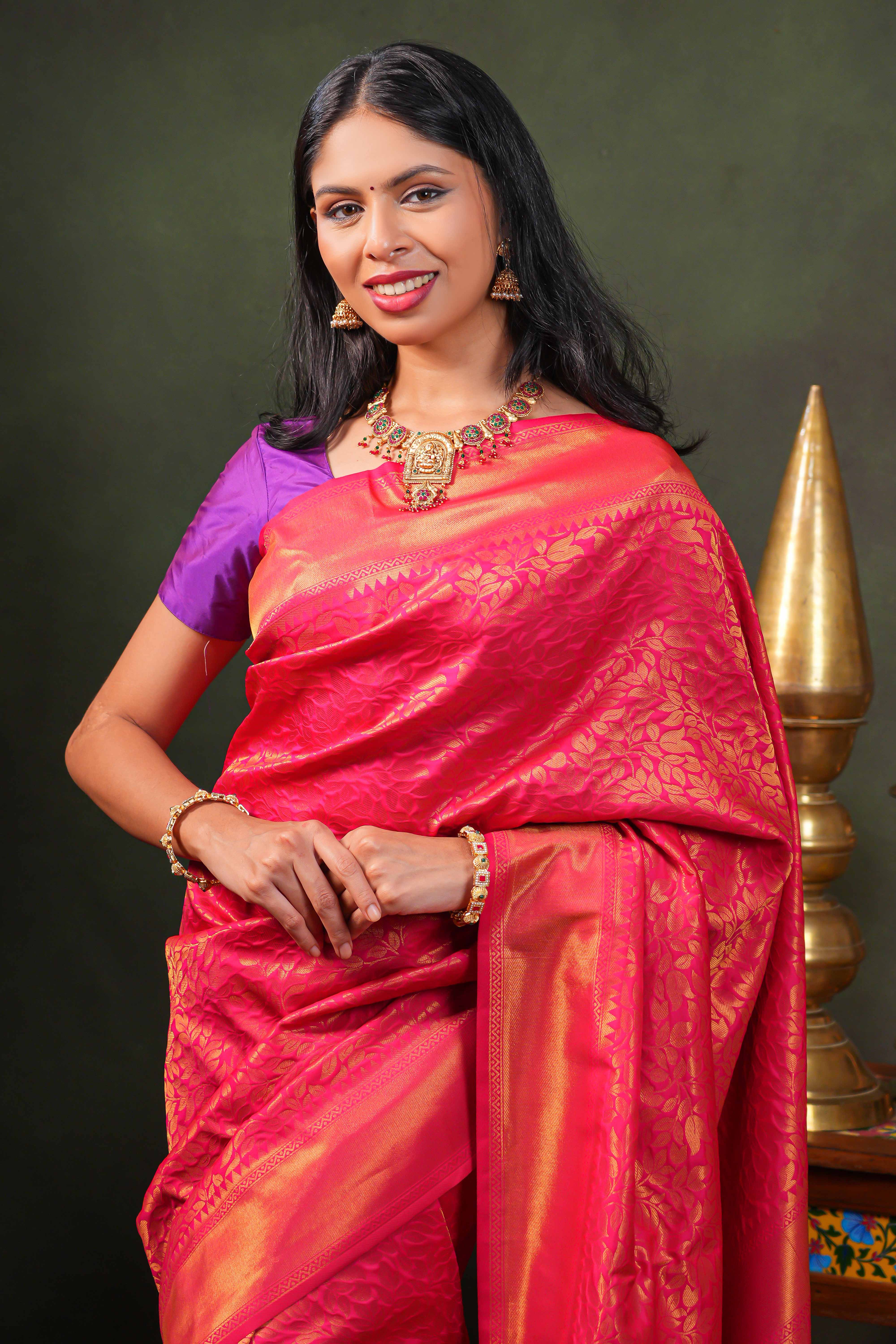 Pink colour Semi Soft Silk Saree with intricate gold zari Leaf vine weaving patterns and Rich zari woven pallu with Matching blouse