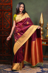 Maroon Semi Soft Silk Saree with elegant gold zari butta motifs gold zari woven Border with Contrast Blouse