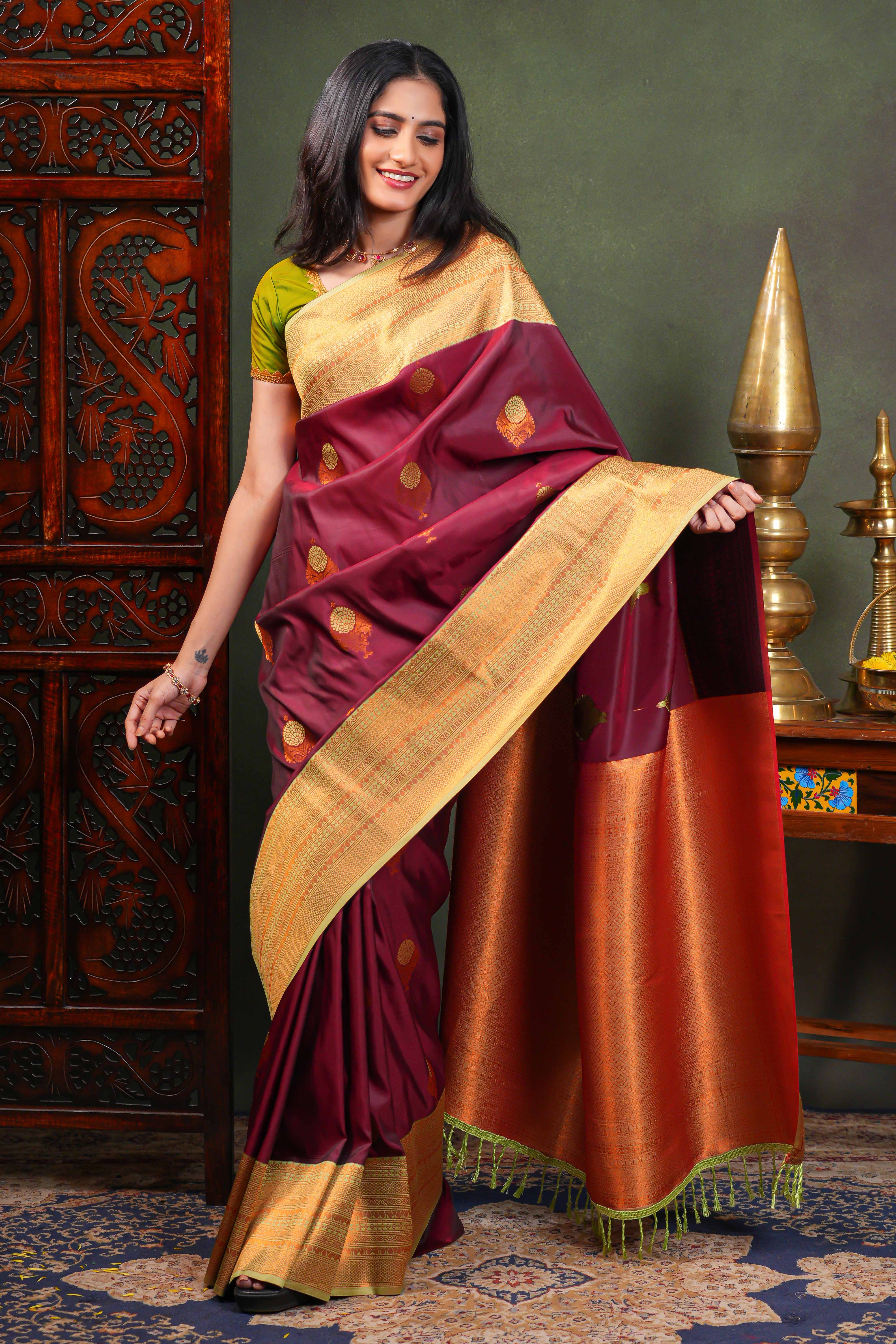Maroon Semi Soft Silk Saree with elegant gold zari butta motifs gold zari woven Border with Contrast Blouse