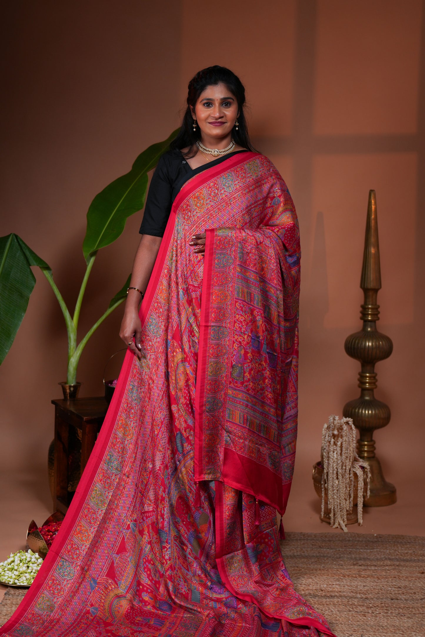 Pink mughal style foil print georgette saree with self border and matching floral printed blouse