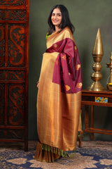 Maroon Semi Soft Silk Saree with elegant gold zari butta motifs gold zari woven Border with Contrast Blouse