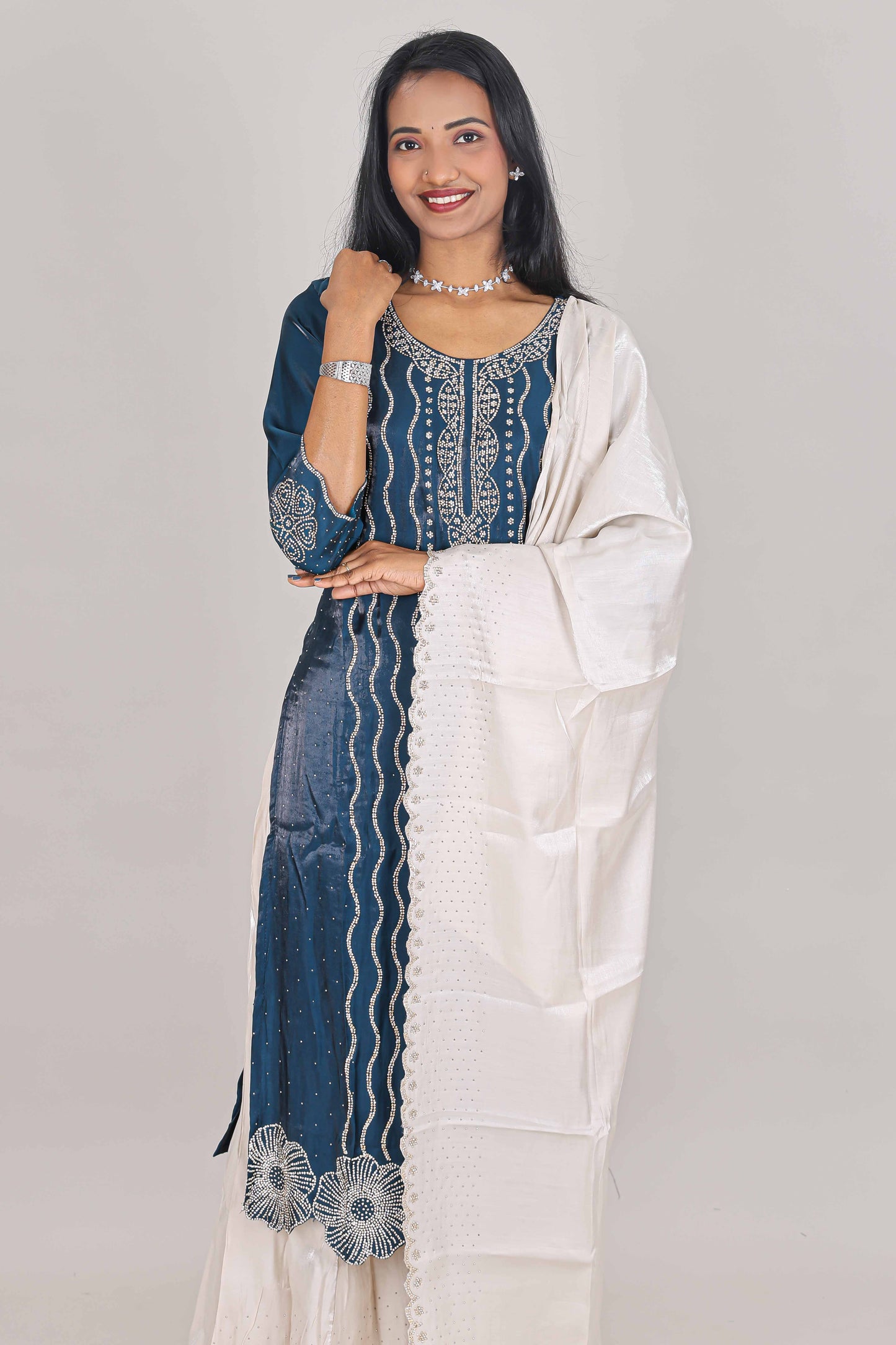 Midnight blue striped stone work embroidered sharara set with 3/4 sleeves, U-neck contrast bottom and dupatta