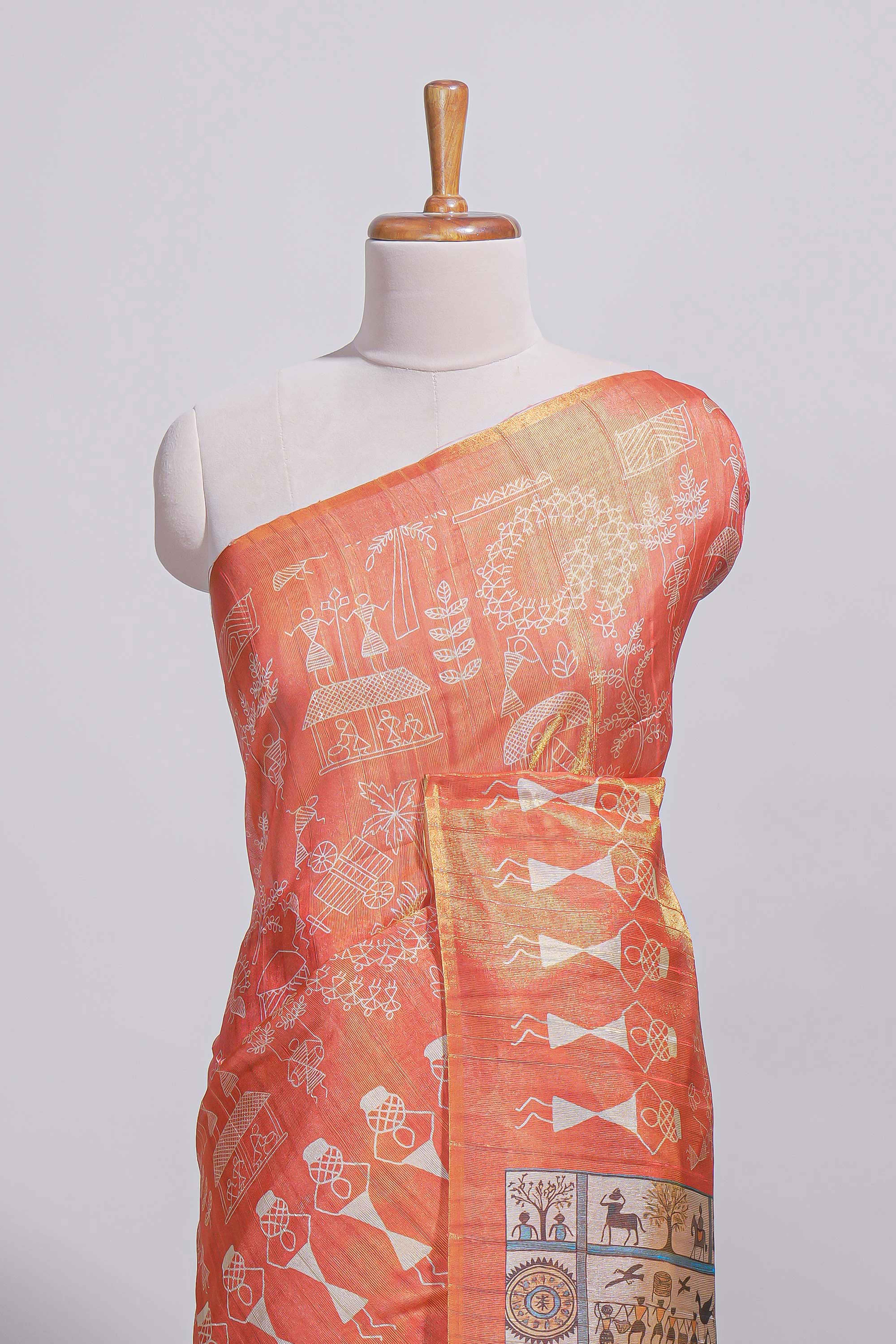 Orange warli printed semi tussar sareewith contrast warli printed pallu and matching blouse