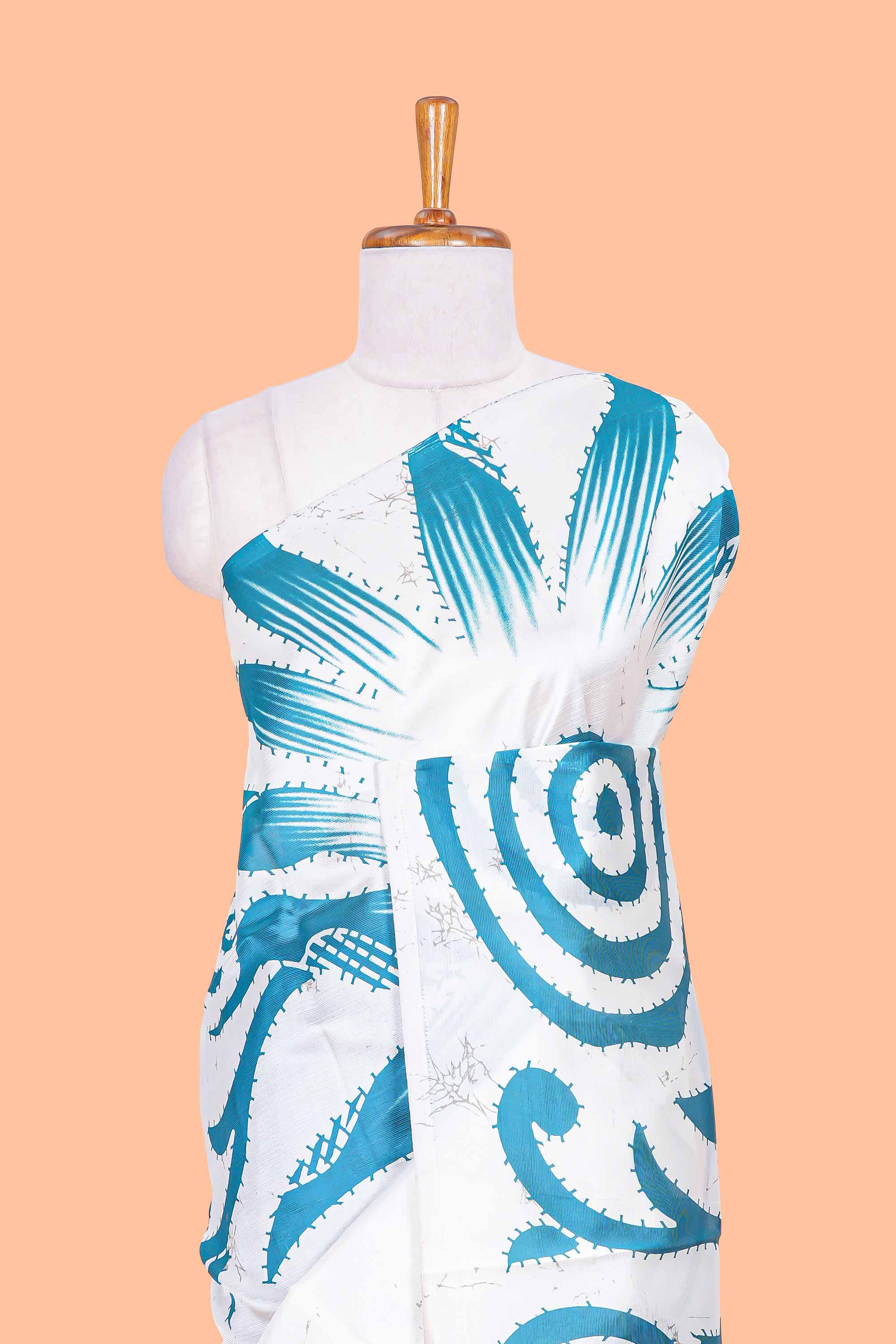 White and navy blue floral print litchi art silk saree with scallop print pallu