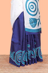 White and navy blue floral print litchi art silk saree with scallop print pallu