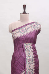 Tussar Silk Saree with a textured violet body geometric woven border and a designer pallu with tassel along with blouse