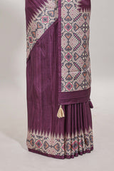 Tussar Silk Saree with a textured violet body geometric woven border and a designer pallu with tassel along with blouse