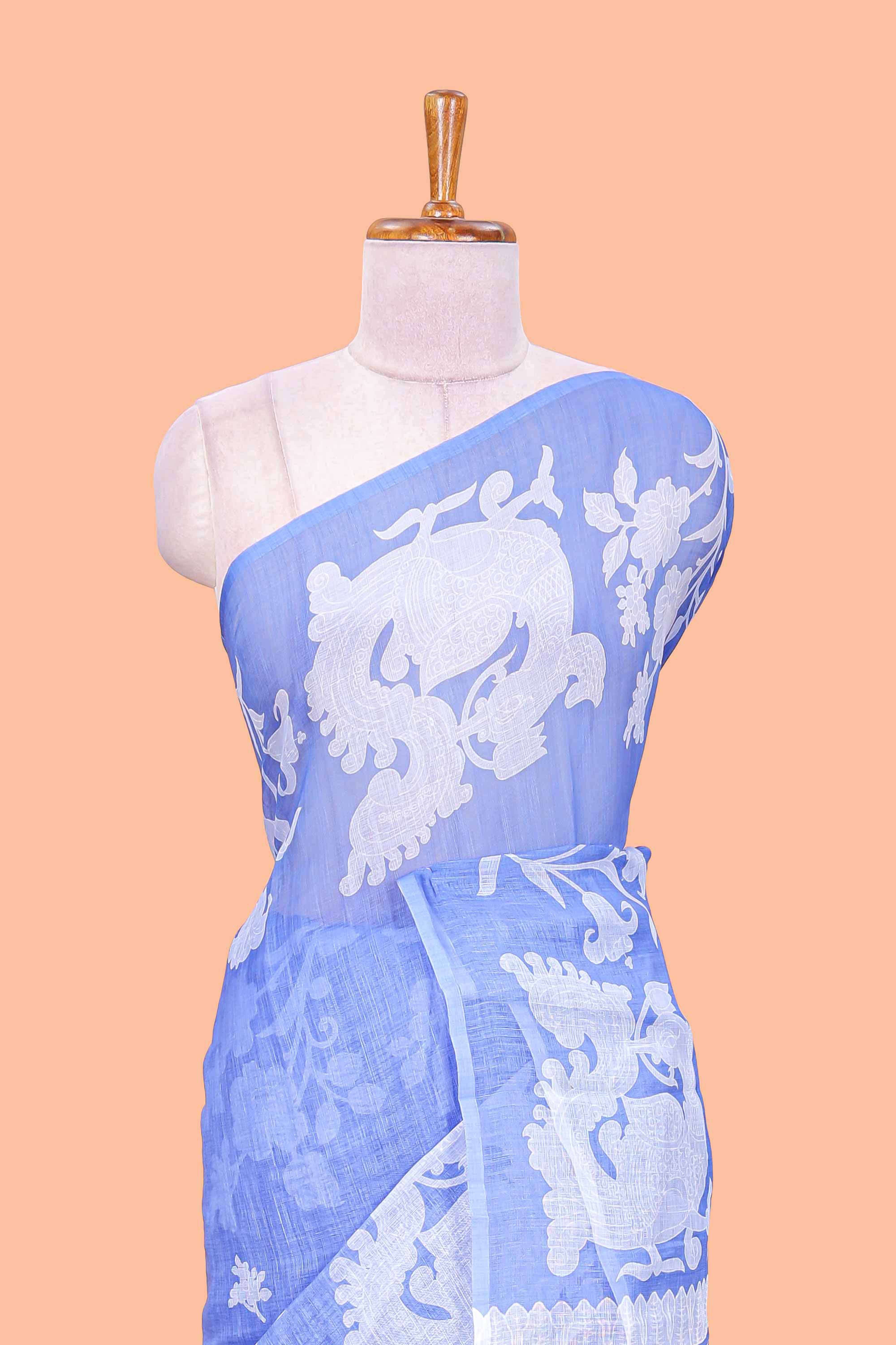 Blue linen cotton floral and birds print saree with self border and matching printed blouse