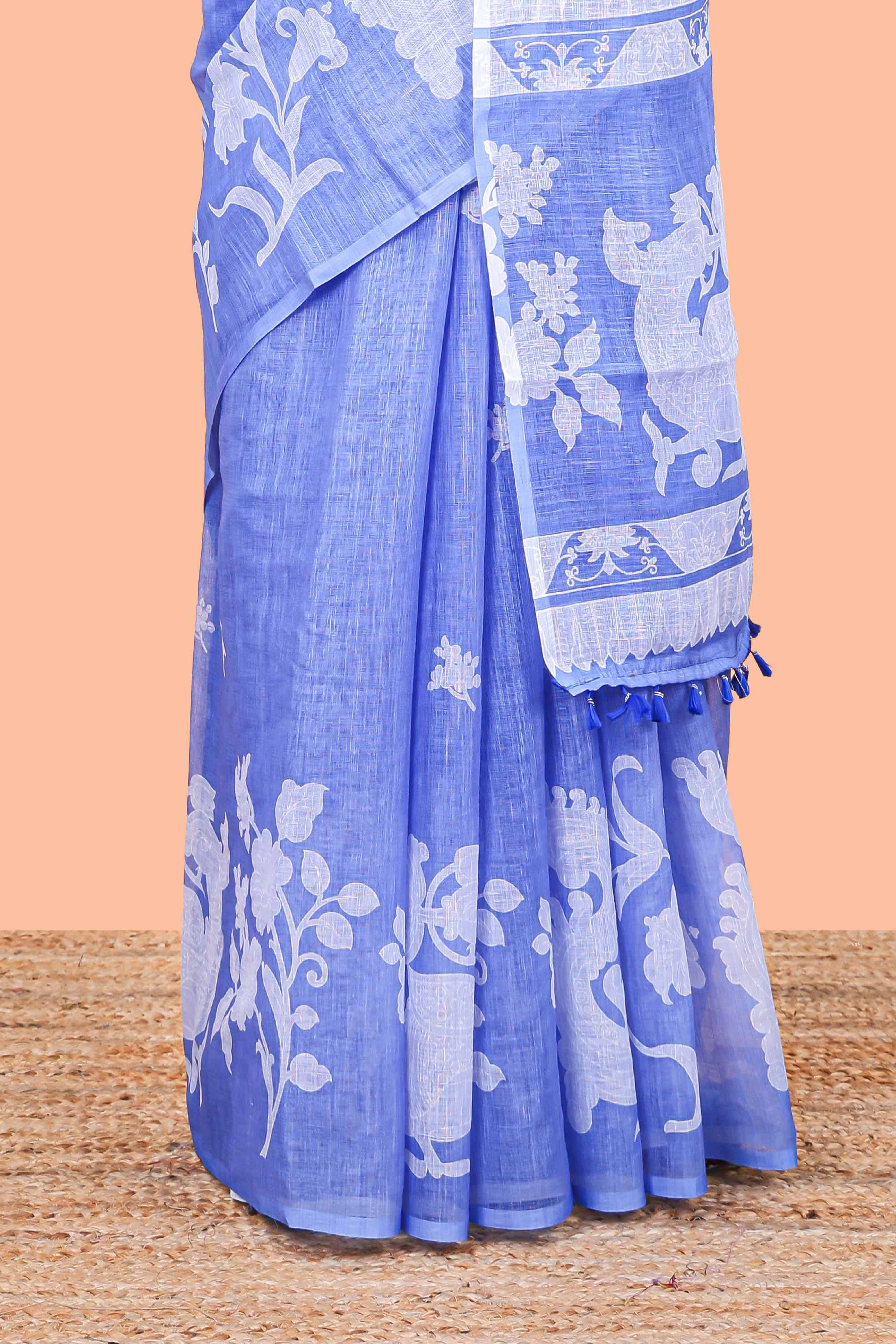 Blue linen cotton floral and birds print saree with self border and matching printed blouse
