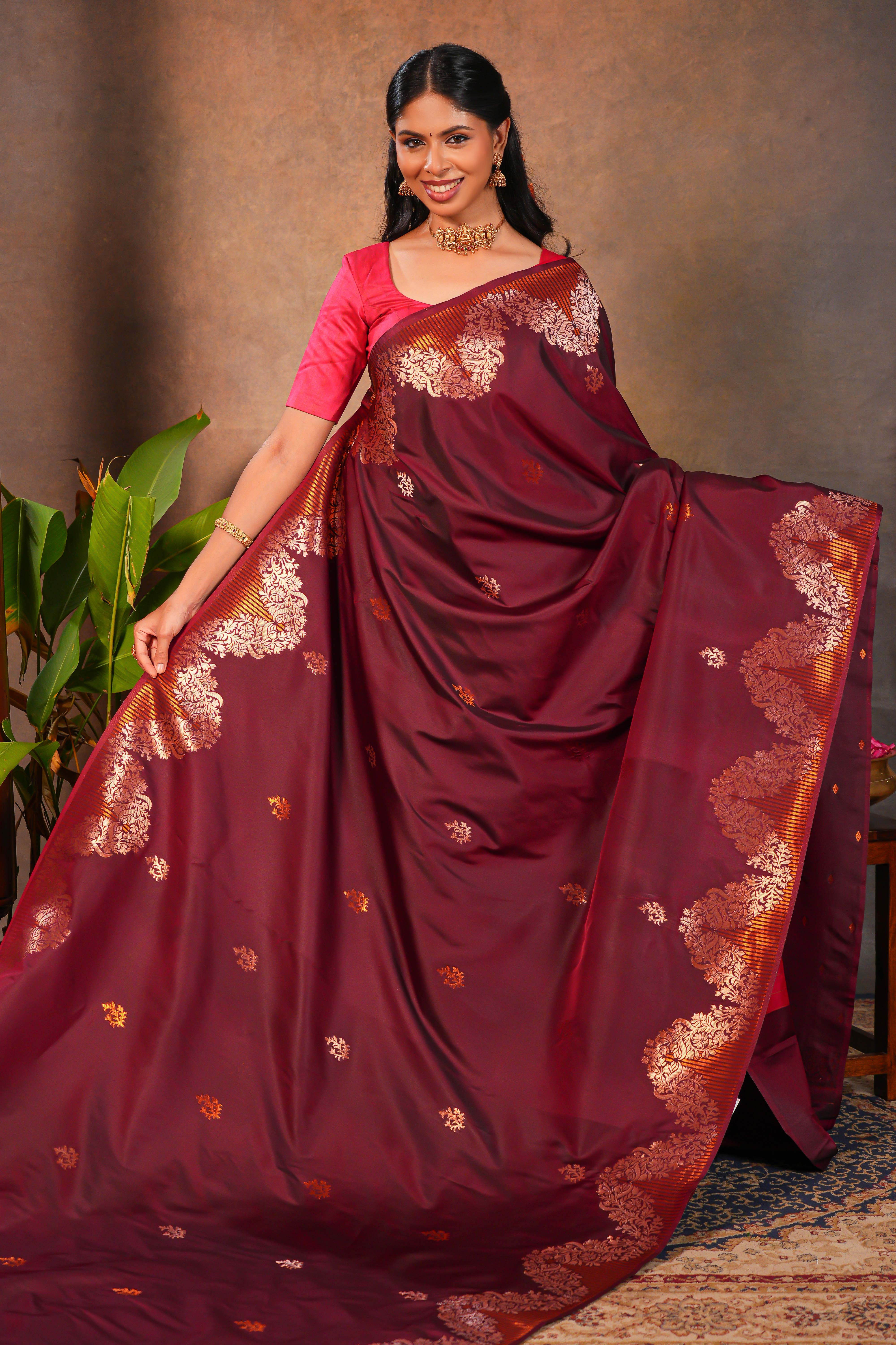 Maroon Semi soft Silk Saree Gold Zari Woven Paisley Motifs with Woven Zari Border and Contrast Blouse