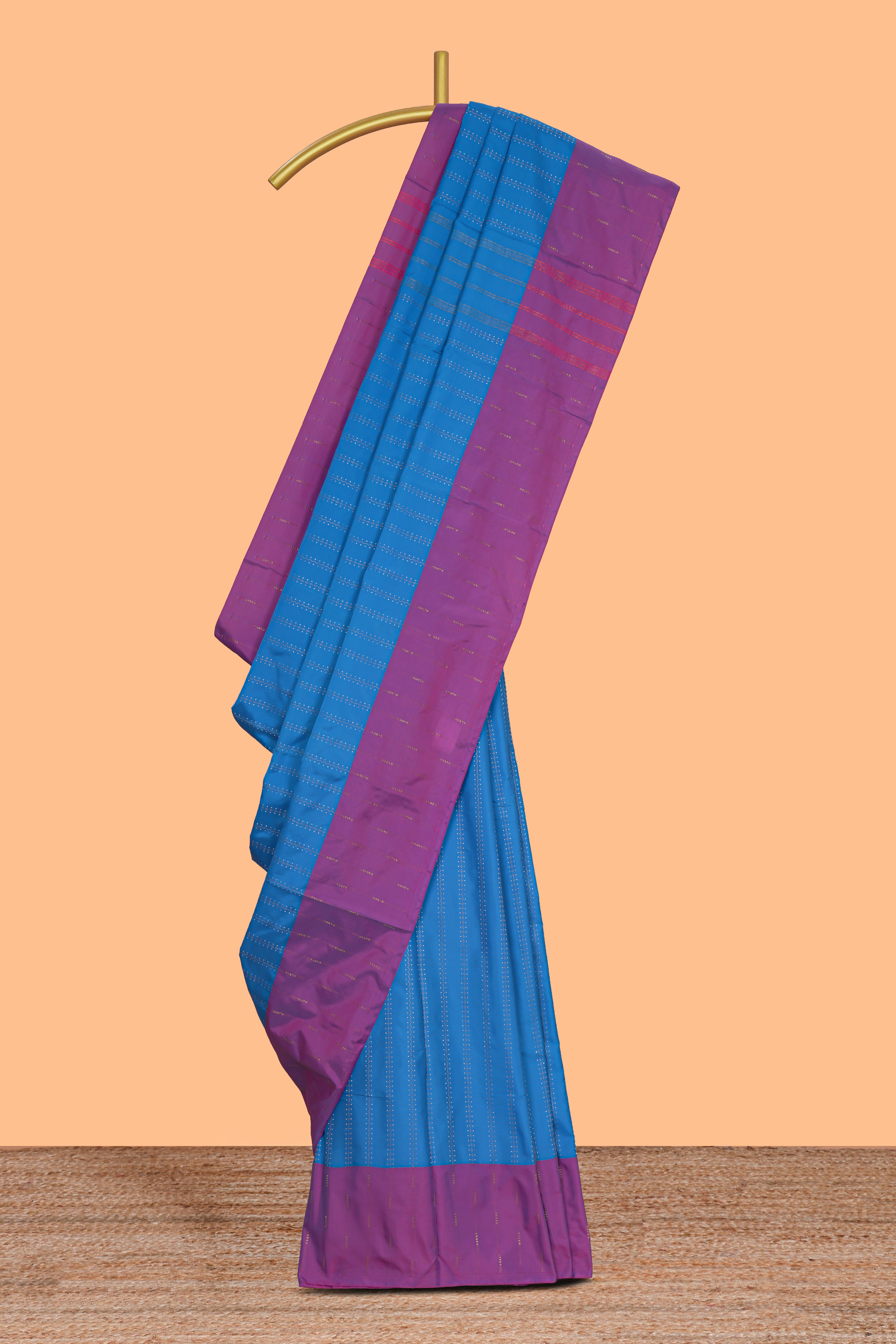 Blue striped design arani gift saree with contrast border and matching blouse