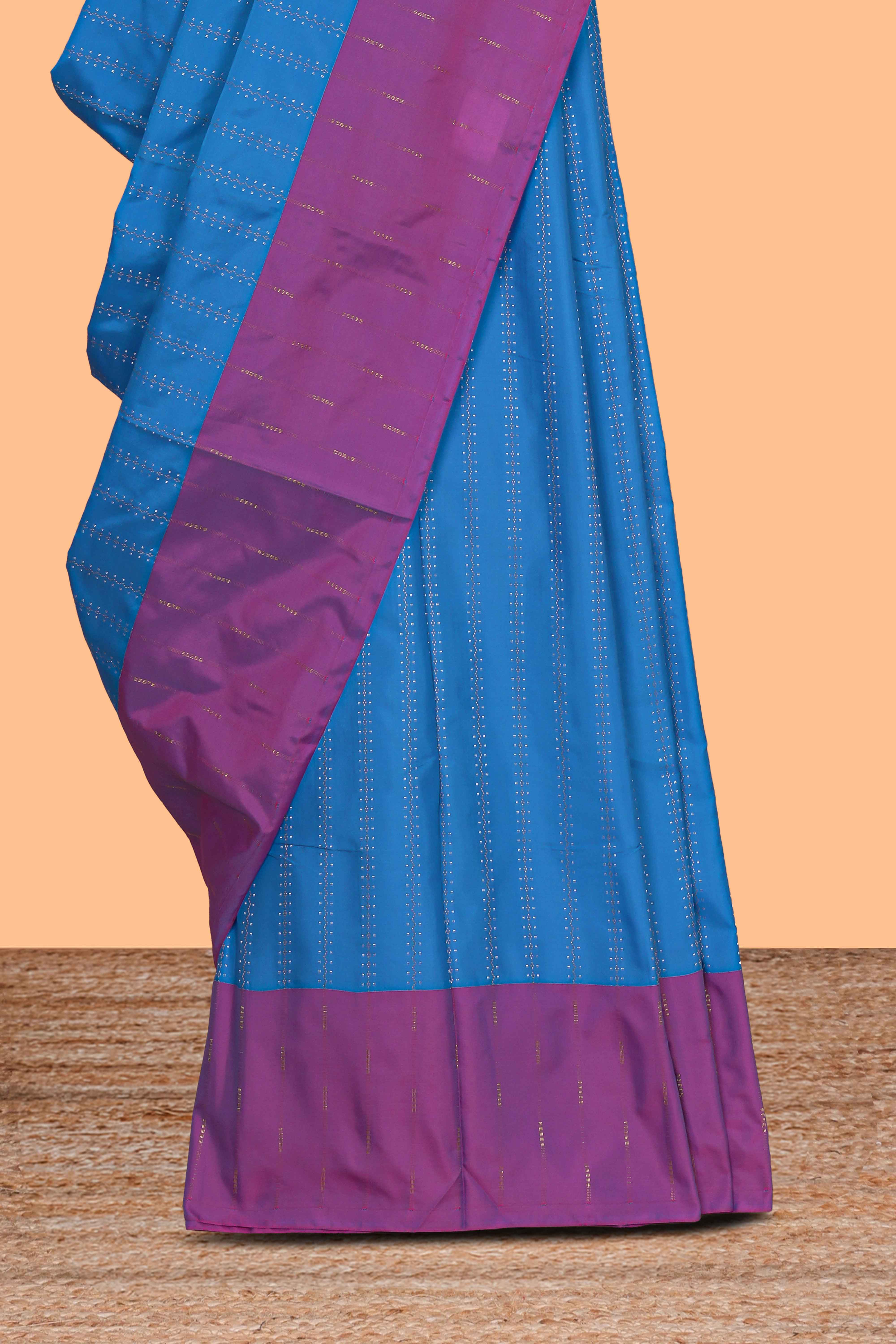 Blue striped design arani gift saree with contrast border and matching blouse