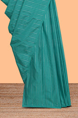 Teal green striped design arani gift saree with contrast pallu and plain blouse
