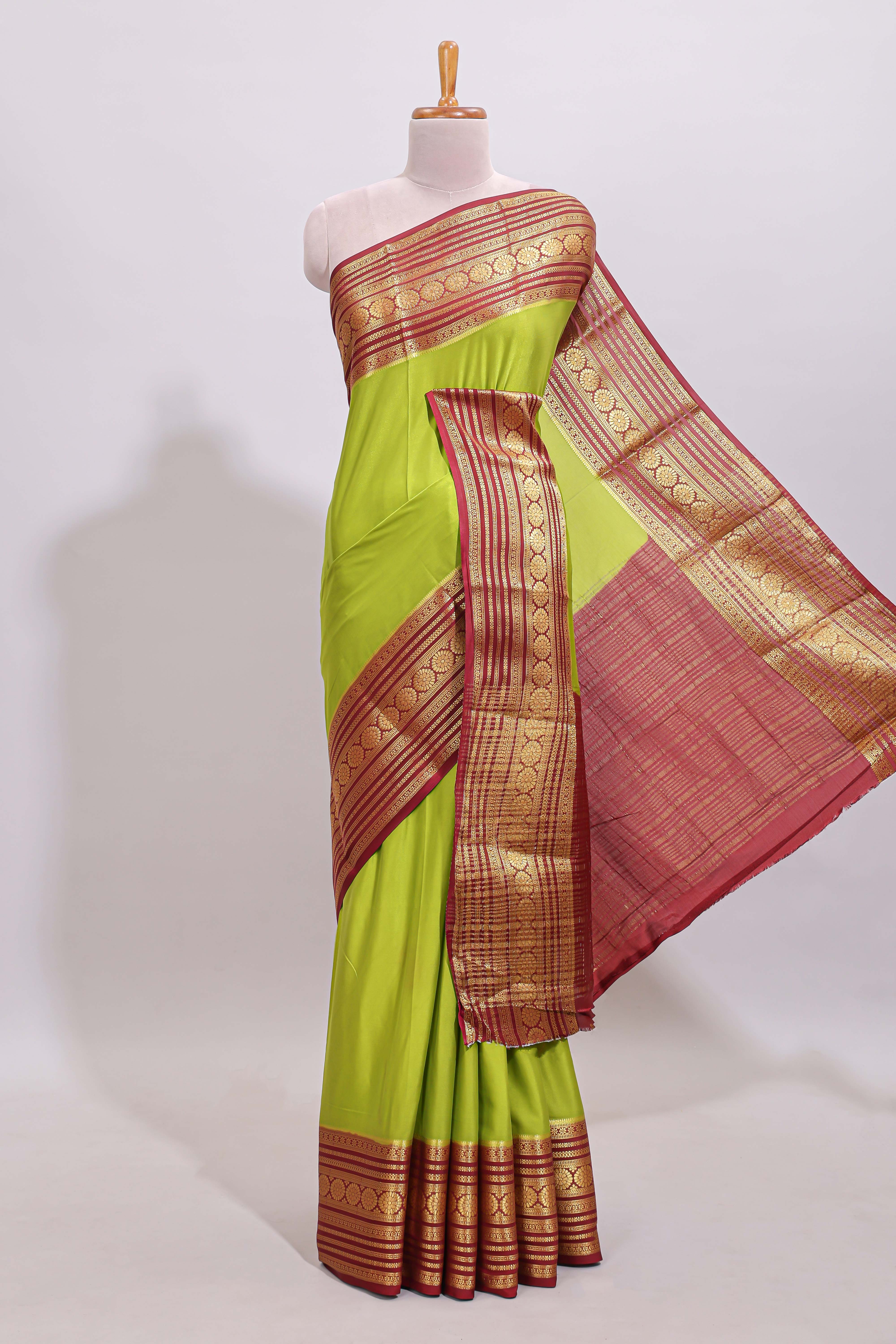 Green plain art mysore silk saree with contrast zari border and plain blouse