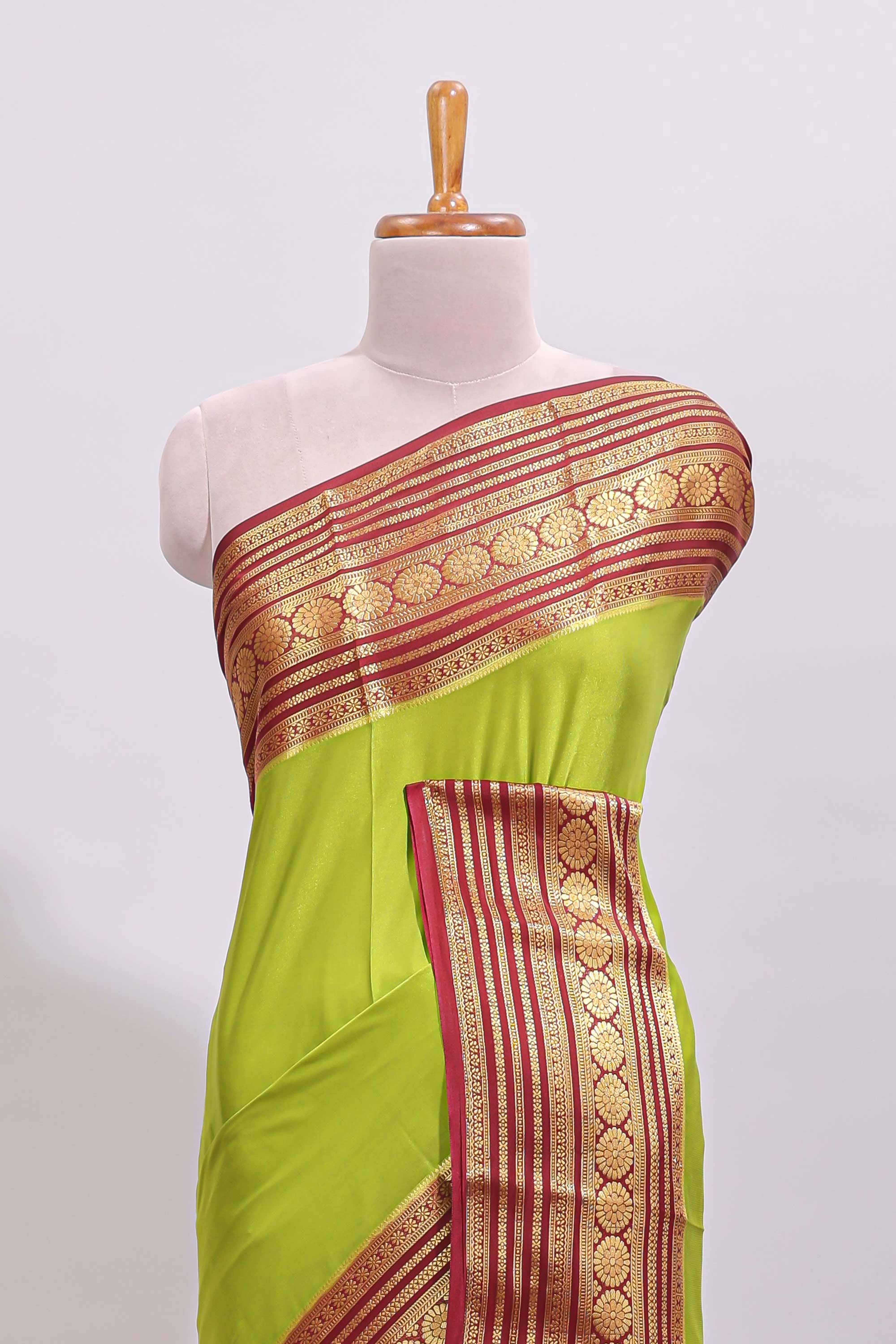 Green plain art mysore silk saree with contrast zari border and plain blouse
