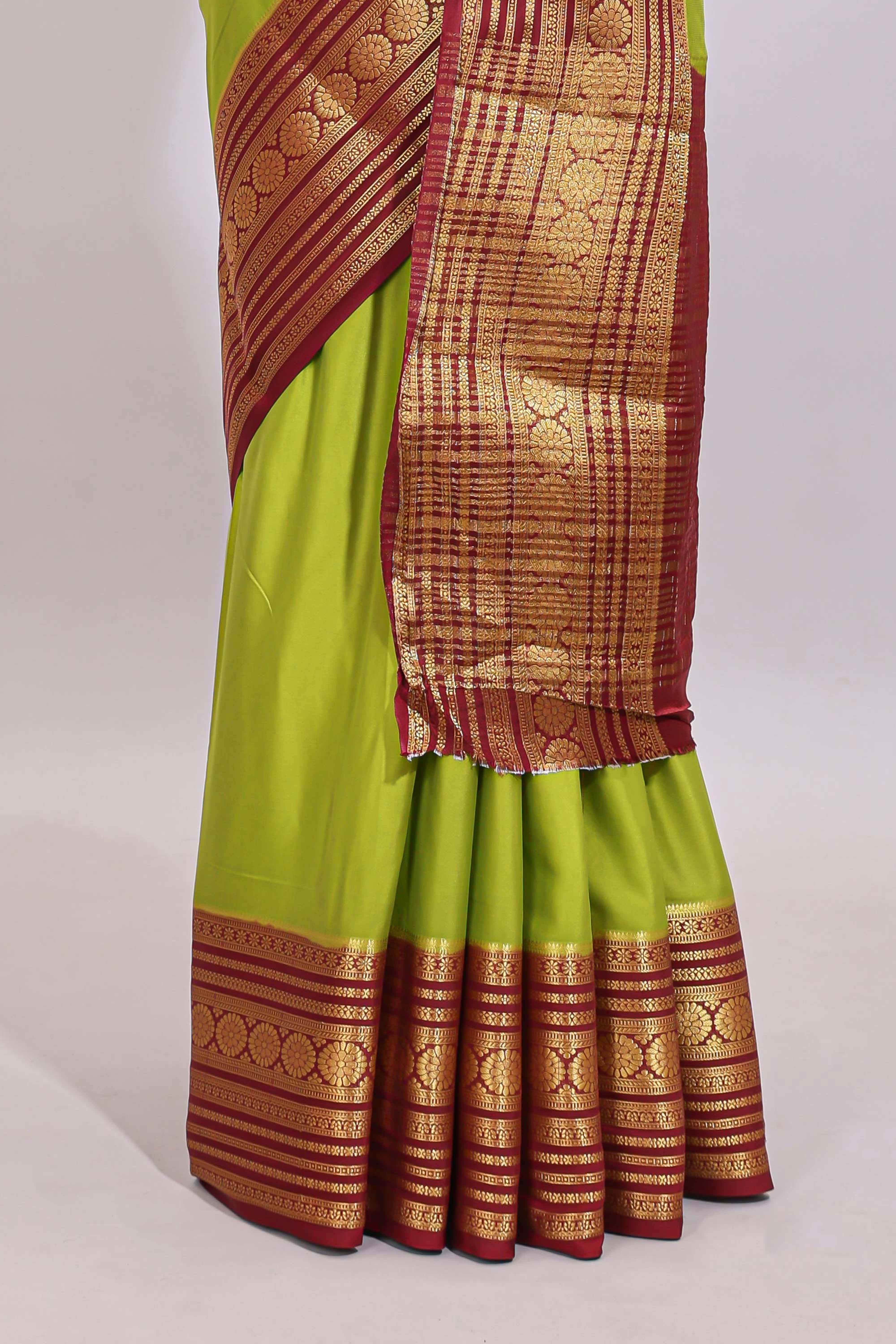 Green plain art mysore silk saree with contrast zari border and plain blouse