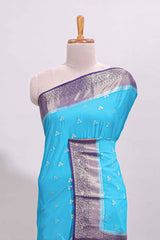 Cyan Blue floral butta motifs art mysore silk saree with contrast zari border and plain blouse