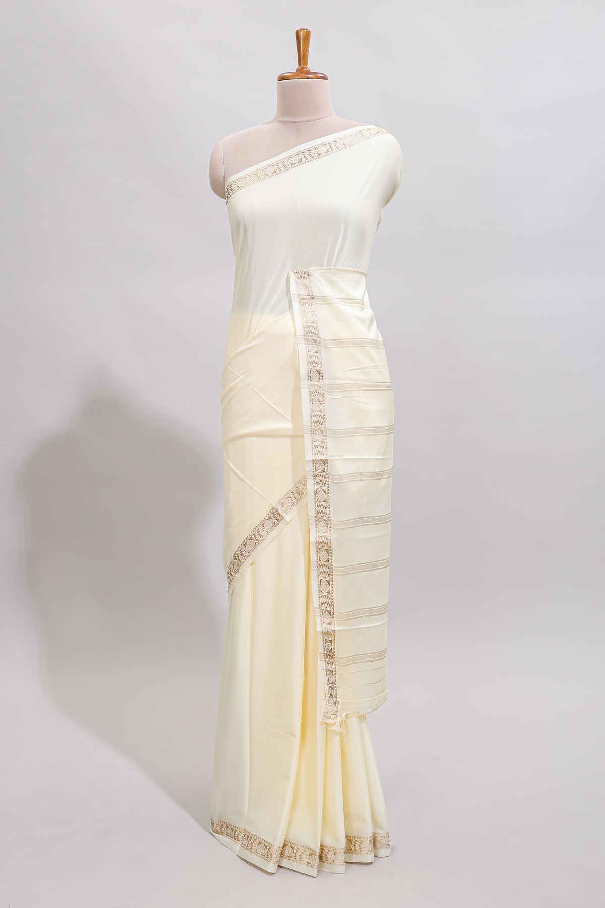 Off white plain art mysore silk saree with self zari border and matching blouse